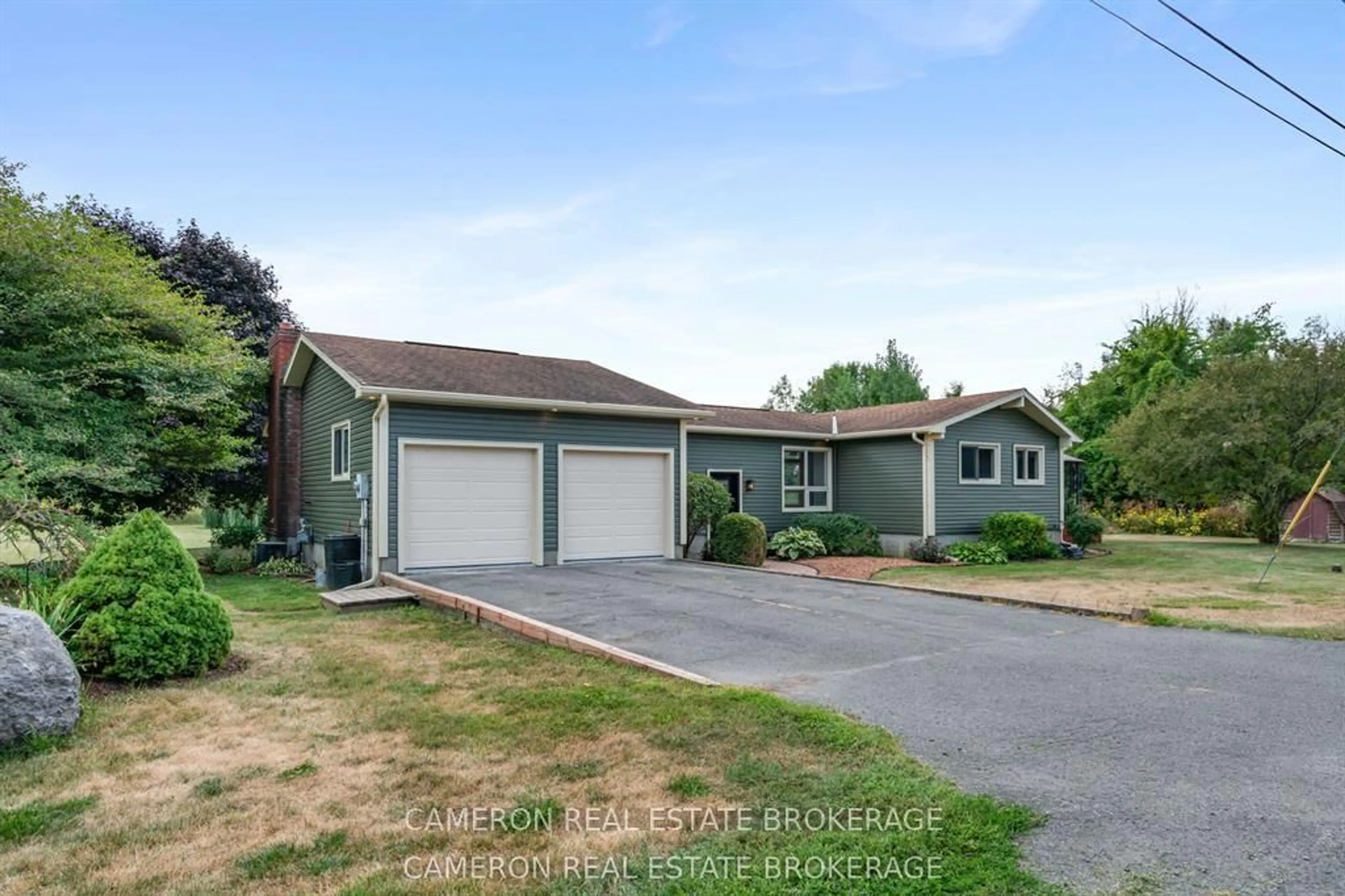 A pic from outside/outdoor area/front of a property/back of a property/a pic from drone, street for 15474 Manning Rd, South Stormont Ontario K0C 1M0