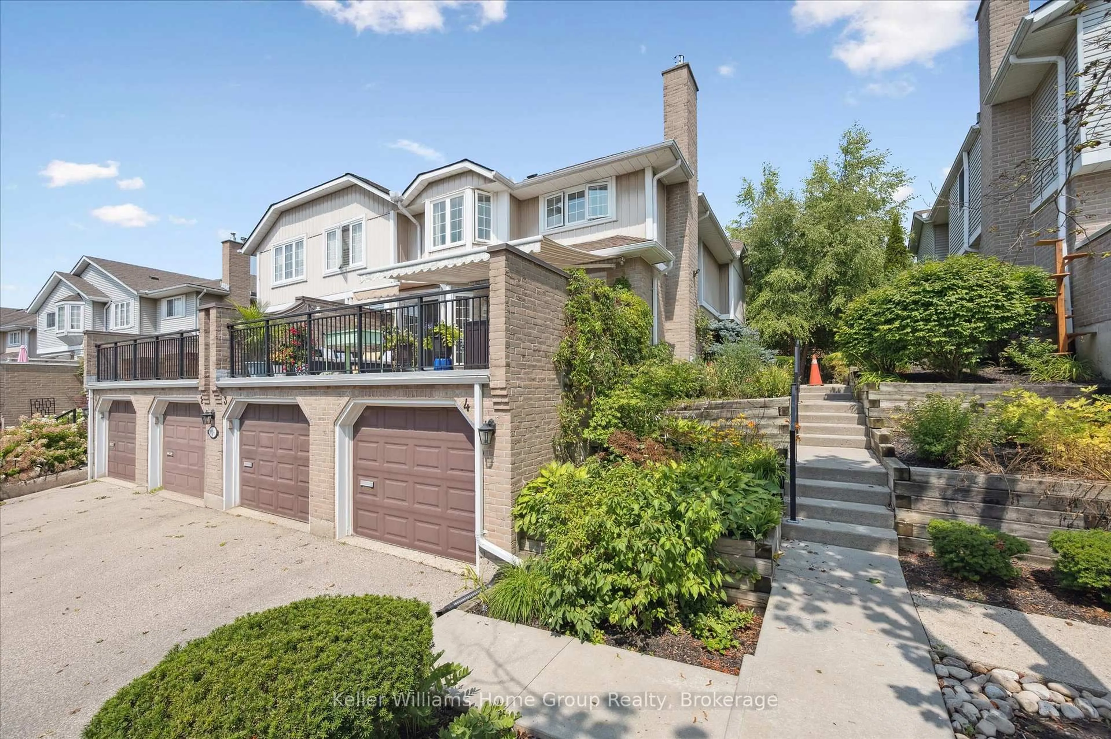 Home with brick exterior material, street for 106 Woodlawn Rd #4, Guelph Ontario N1E 1B7