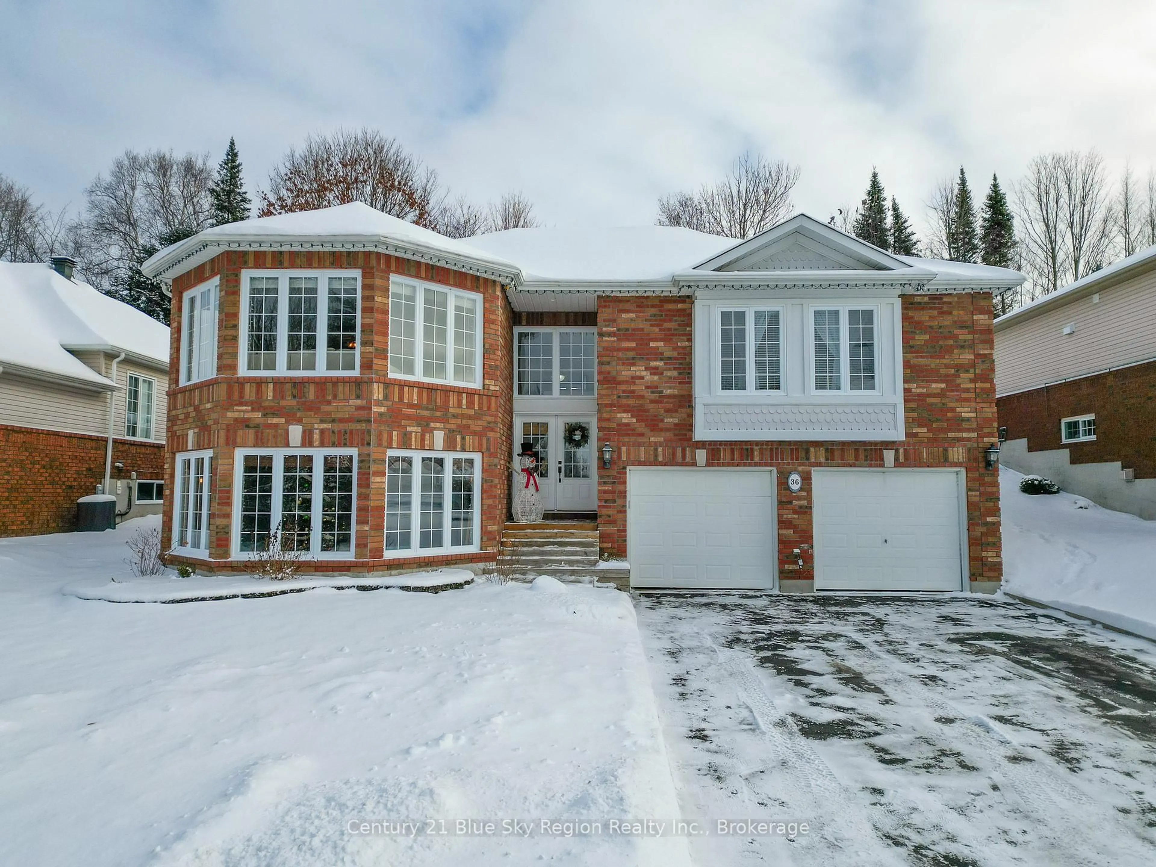 Home with brick exterior material, street for 36 Kenwood Hills Dr, North Bay Ontario P1C 1M1