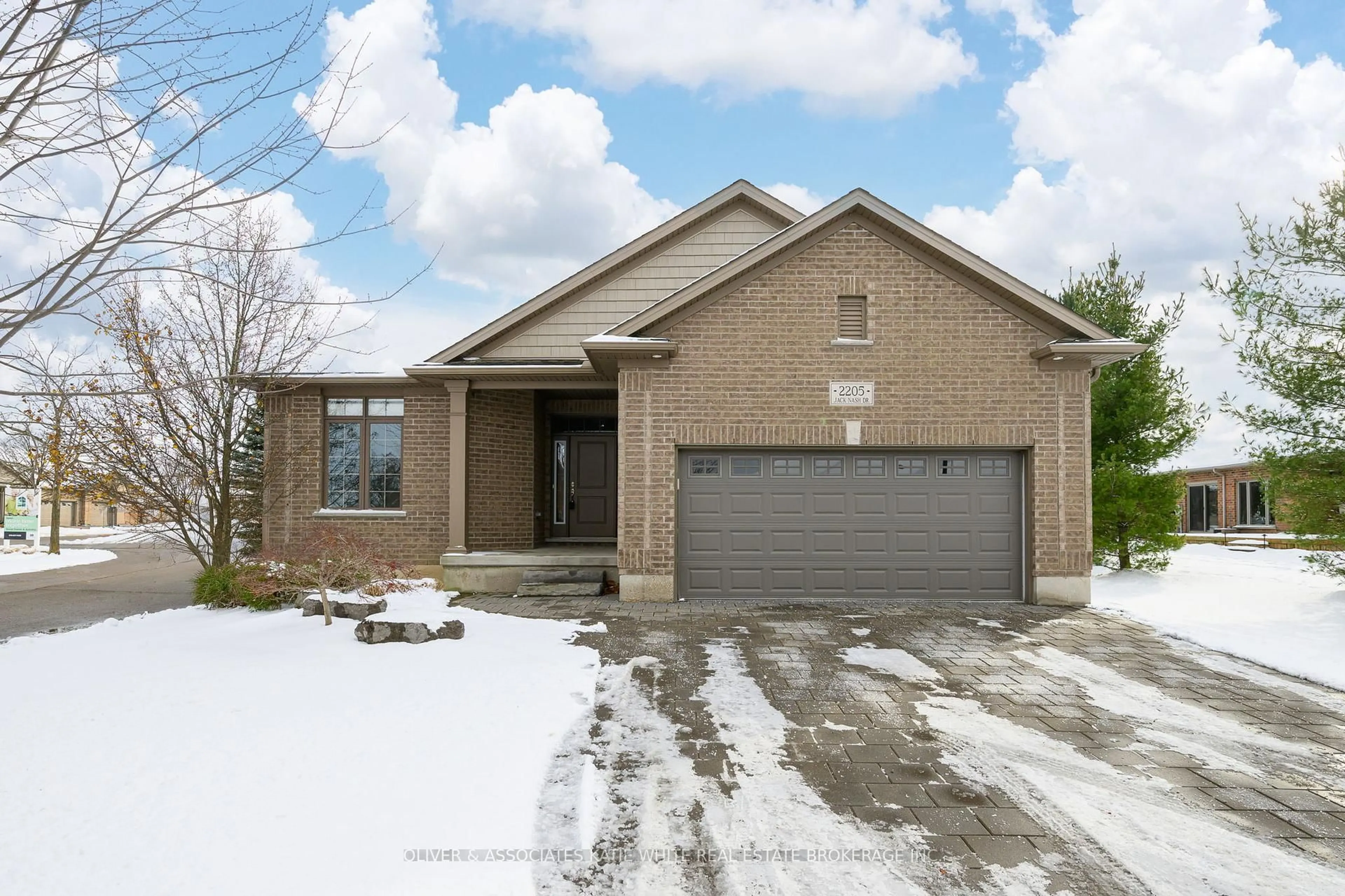 Home with brick exterior material, street for 2205 Jack Nash Dr, London South Ontario N6K 5R3