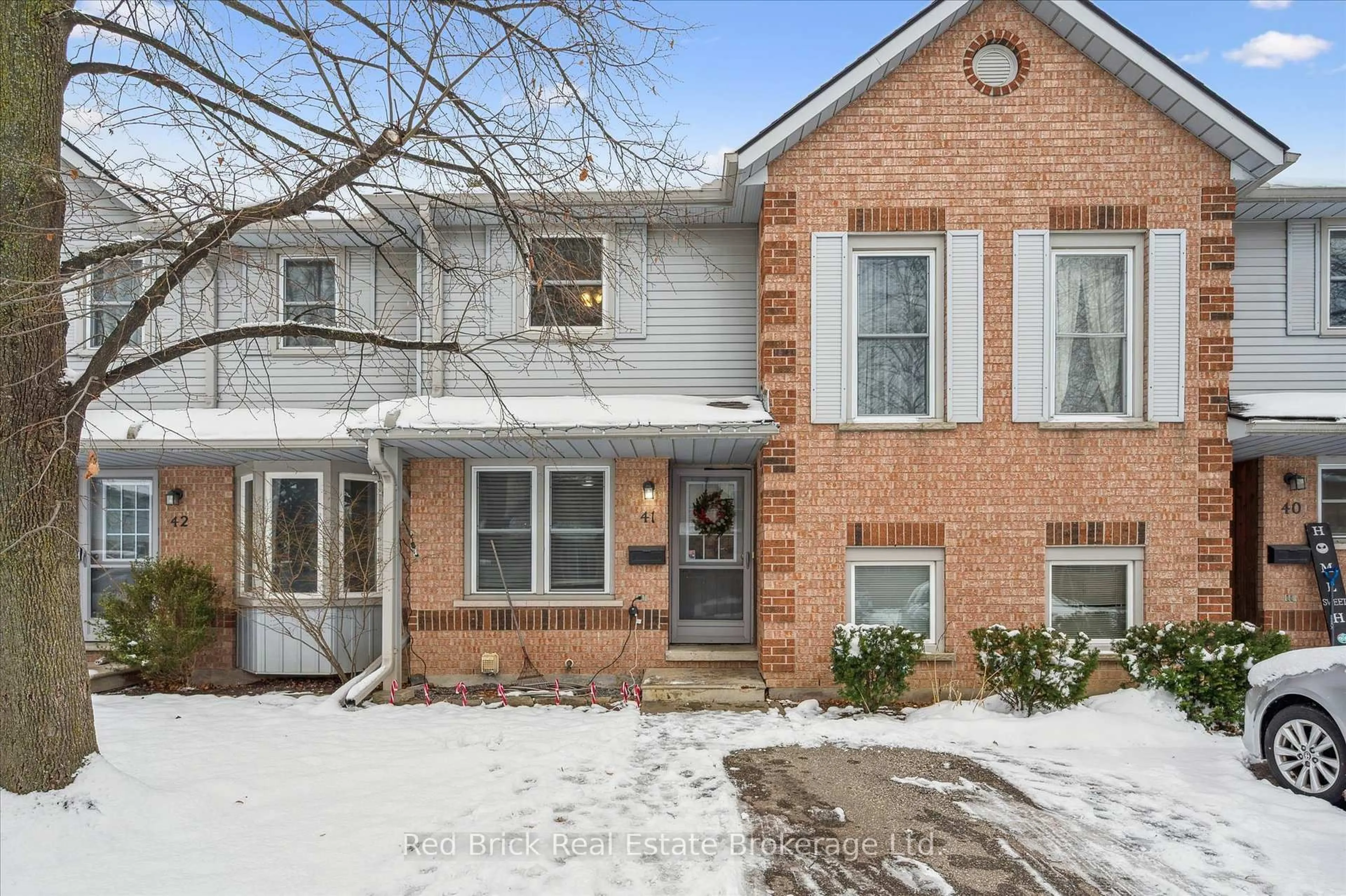 Home with brick exterior material, street for 180 Marksam Rd #41, Guelph Ontario N1H 8G4