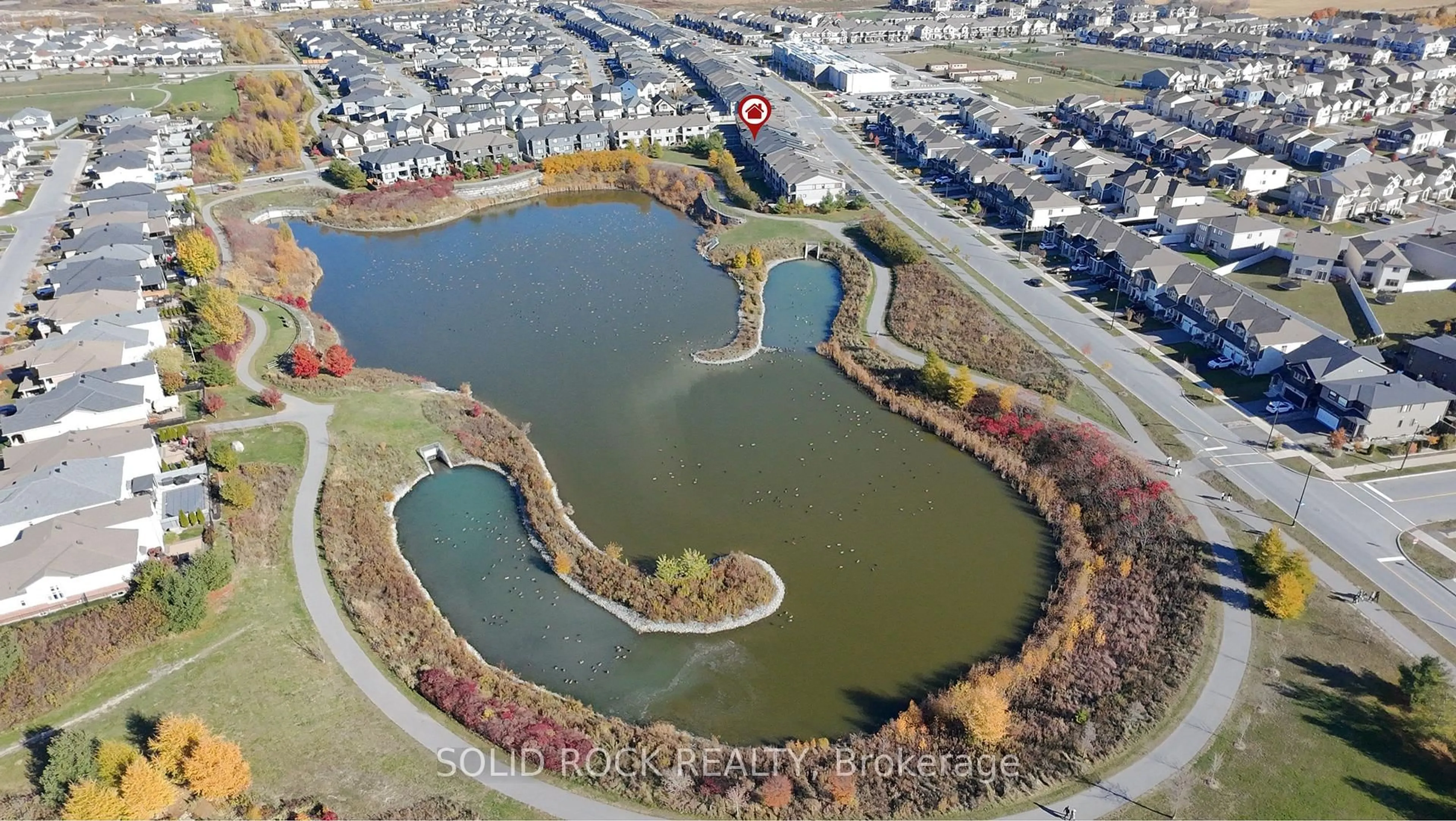 A pic from outside/outdoor area/front of a property/back of a property/a pic from drone, water/lake/river/ocean view for 525 Cope Dr, Stittsville Ontario K2V 0N9