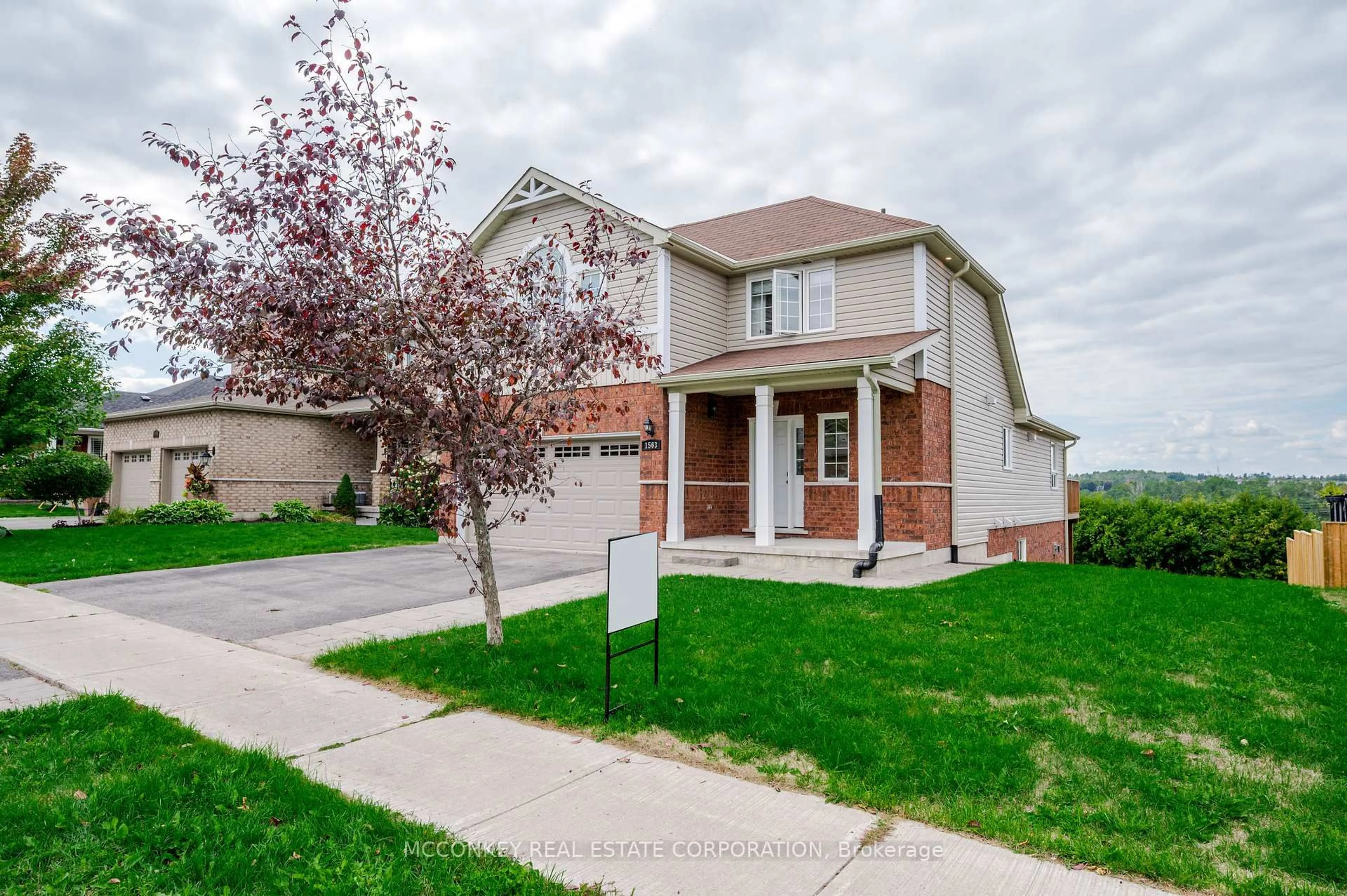 Home with brick exterior material, street for 1563 Scollard Cres, Peterborough Ontario K9H 0A8