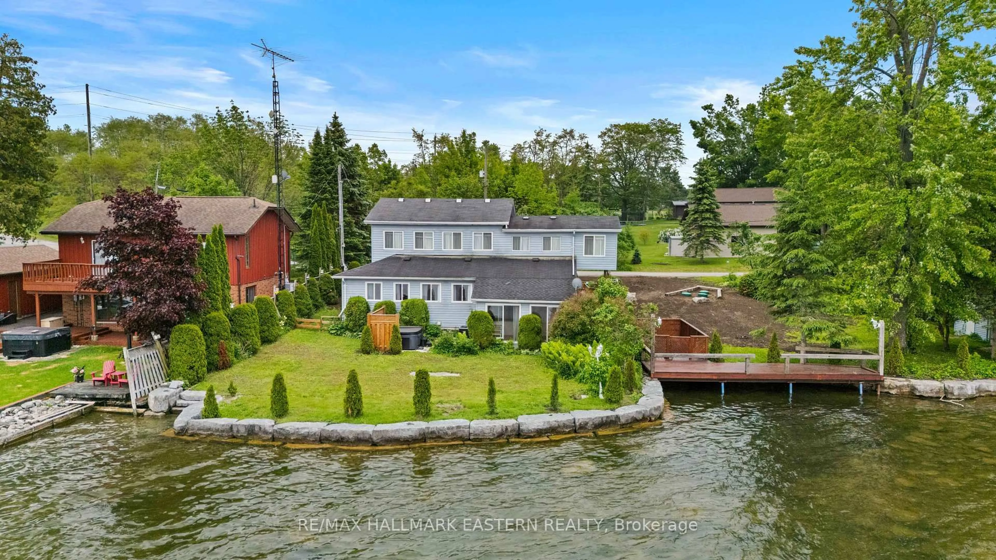 A pic from outside/outdoor area/front of a property/back of a property/a pic from drone, water/lake/river/ocean view for 2452 Upper Chemung Dr, Selwyn Ontario K0L 2H0