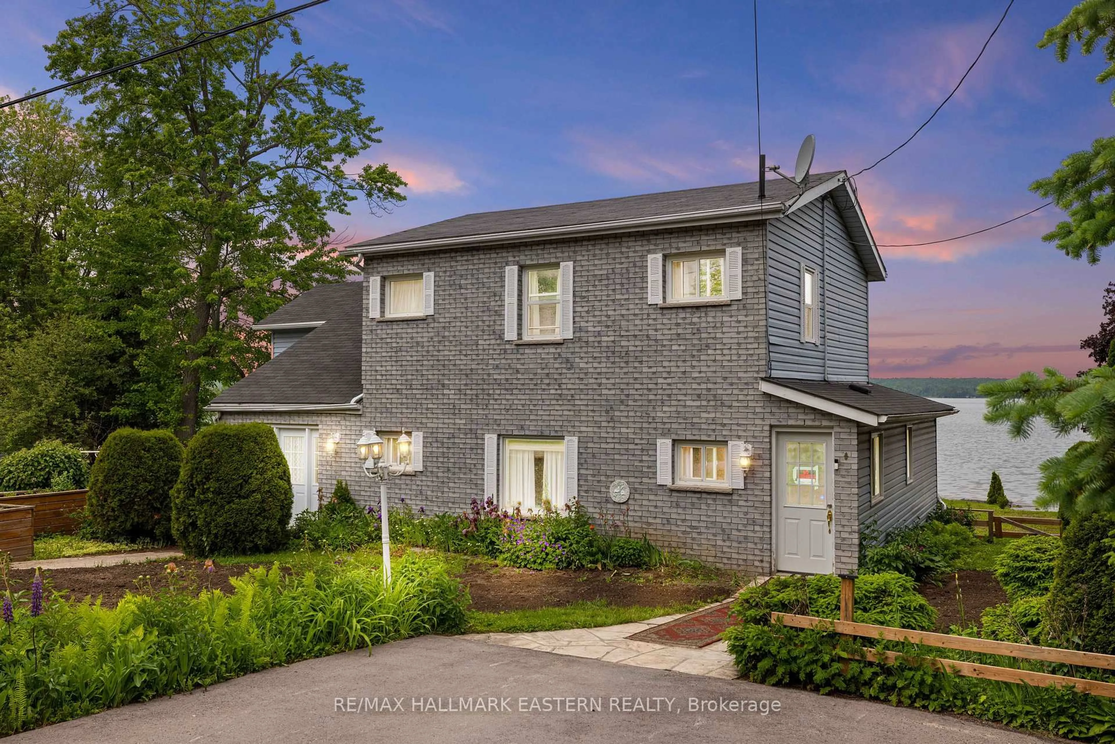 Home with brick exterior material, street for 2452 Upper Chemung Dr, Selwyn Ontario K0L 2H0