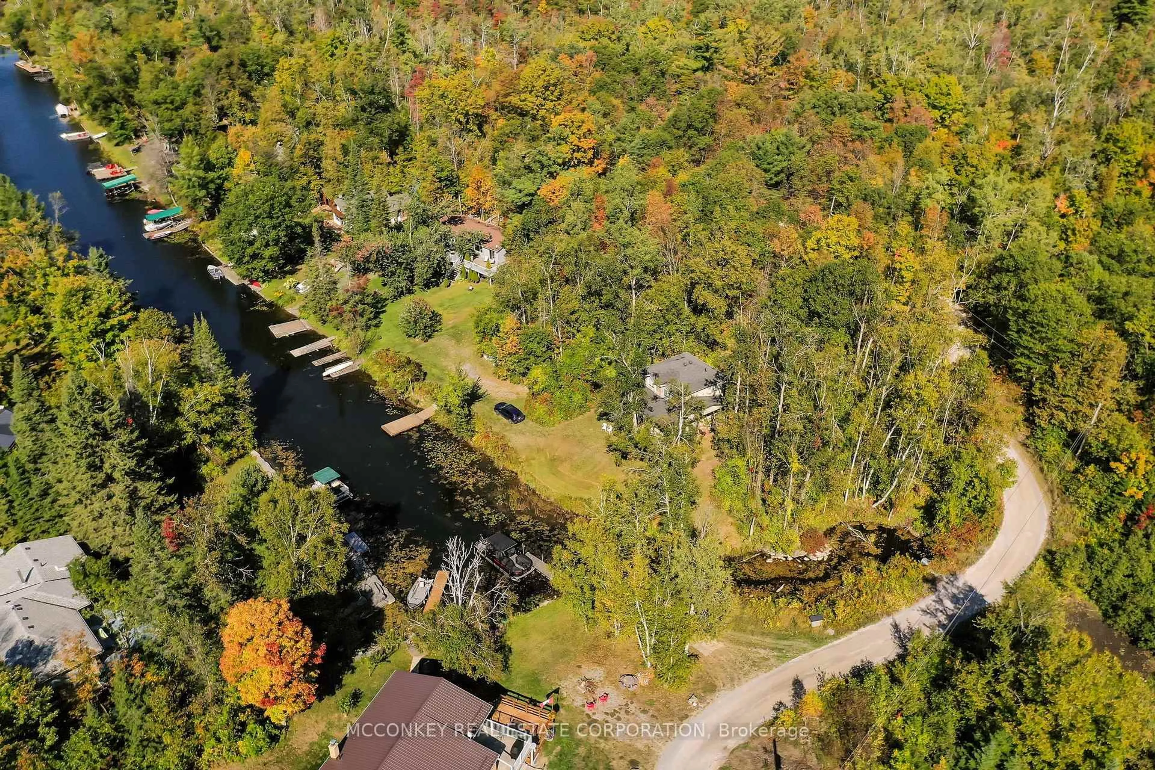 A pic from outside/outdoor area/front of a property/back of a property/a pic from drone, water/lake/river/ocean view for 2370 Julia Shore Rd, Douro-Dummer Ontario K0L 2H0