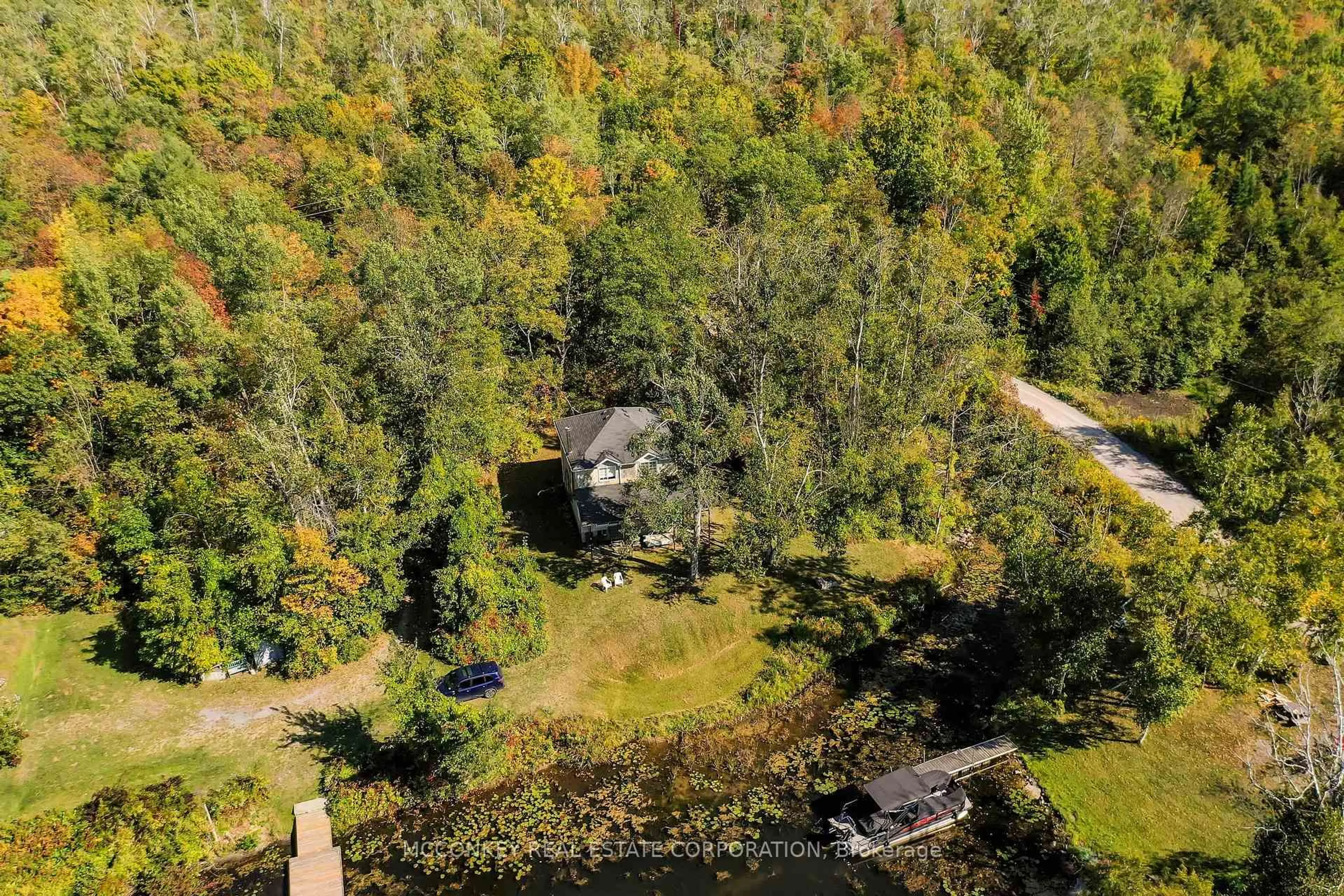 A pic from outside/outdoor area/front of a property/back of a property/a pic from drone, water/lake/river/ocean view for 2370 Julia Shore Rd, Douro-Dummer Ontario K0L 2H0