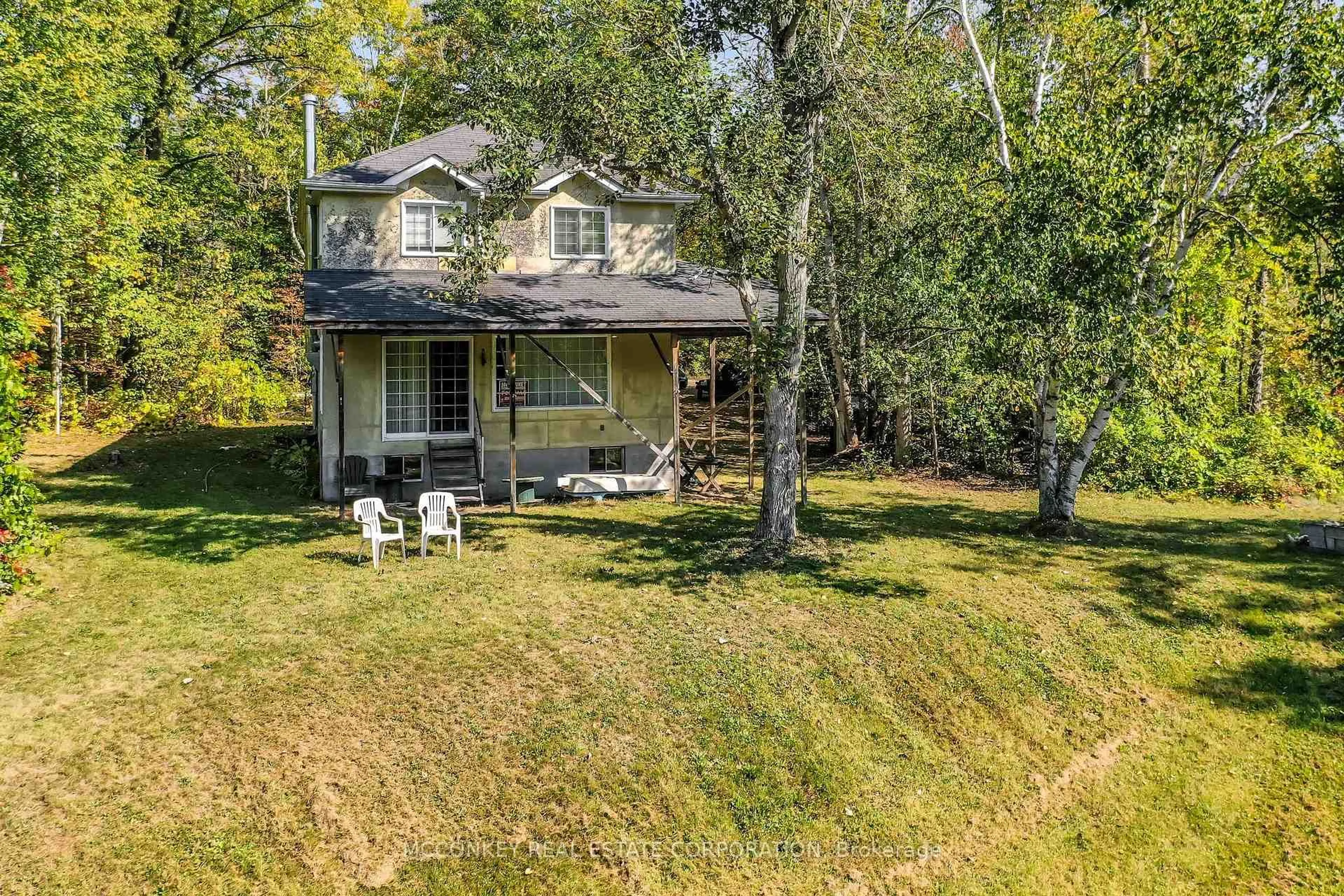 A pic from outside/outdoor area/front of a property/back of a property/a pic from drone, unknown for 2370 Julia Shore Rd, Douro-Dummer Ontario K0L 2H0