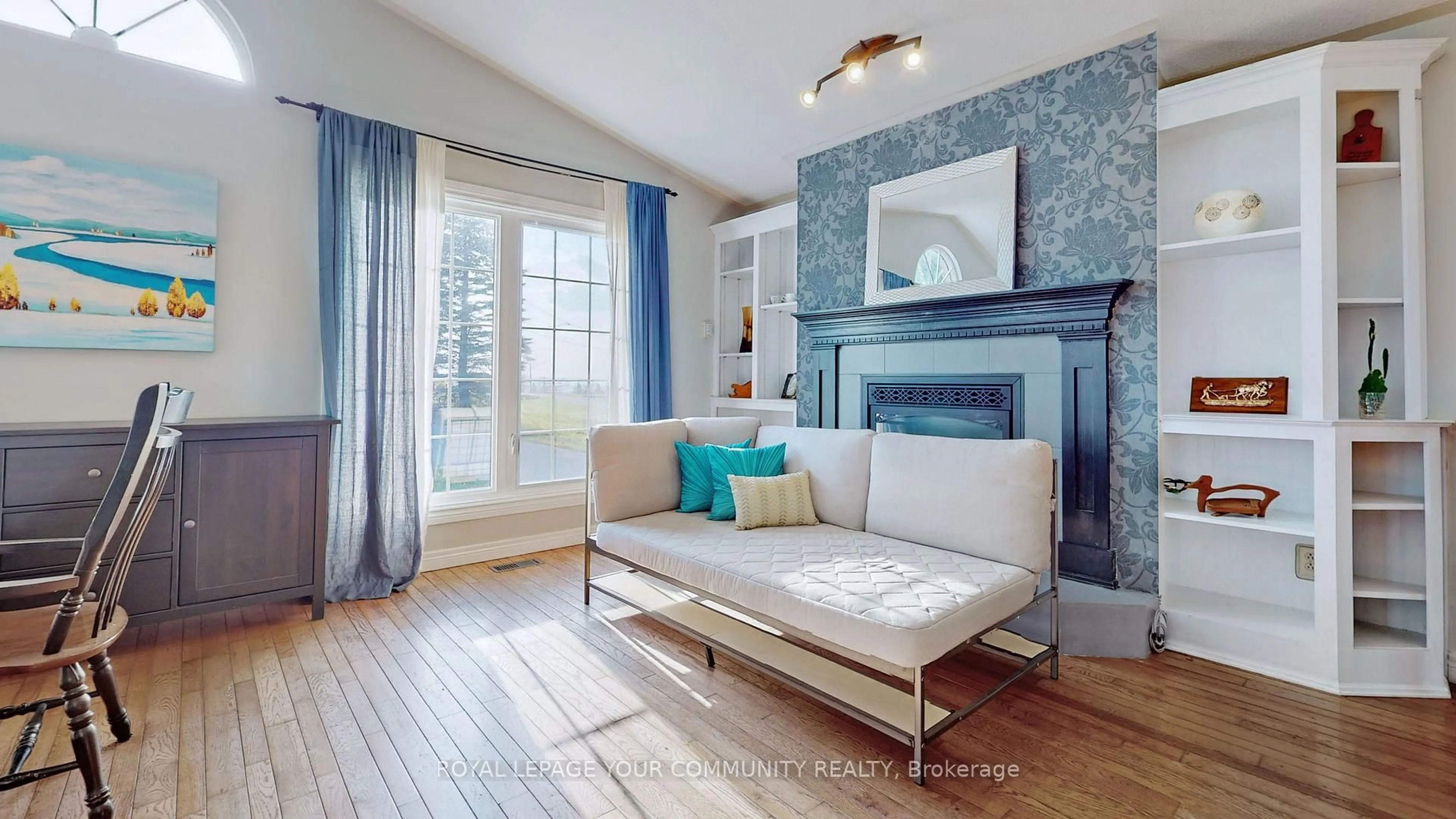 Living room with furniture, wood/laminate floor for 16 Kalman Dr, Cavan Monaghan Ontario L0A 1G0