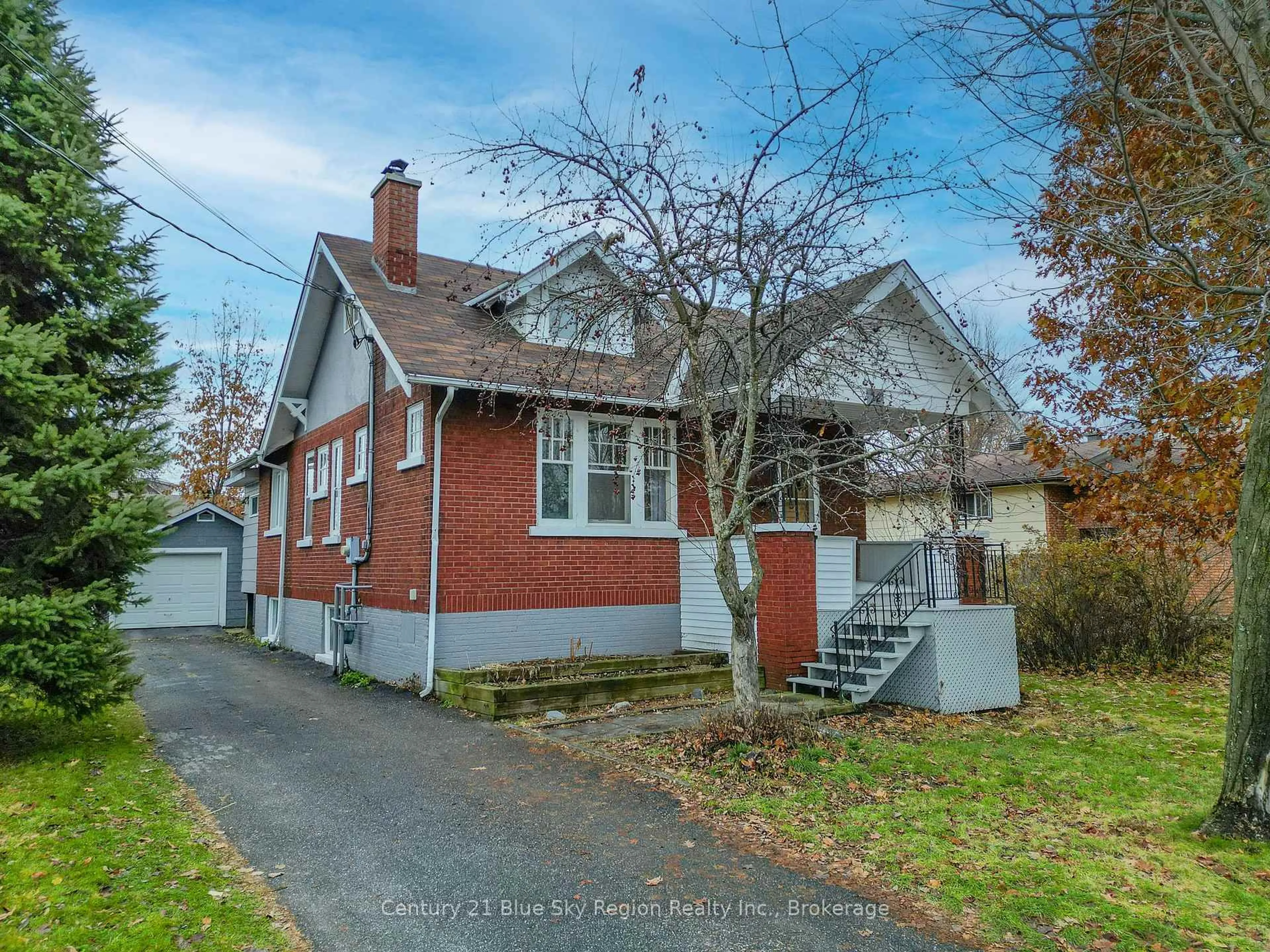 Home with brick exterior material, street for 12 ROWE Ave, North Bay Ontario P1A 1W9
