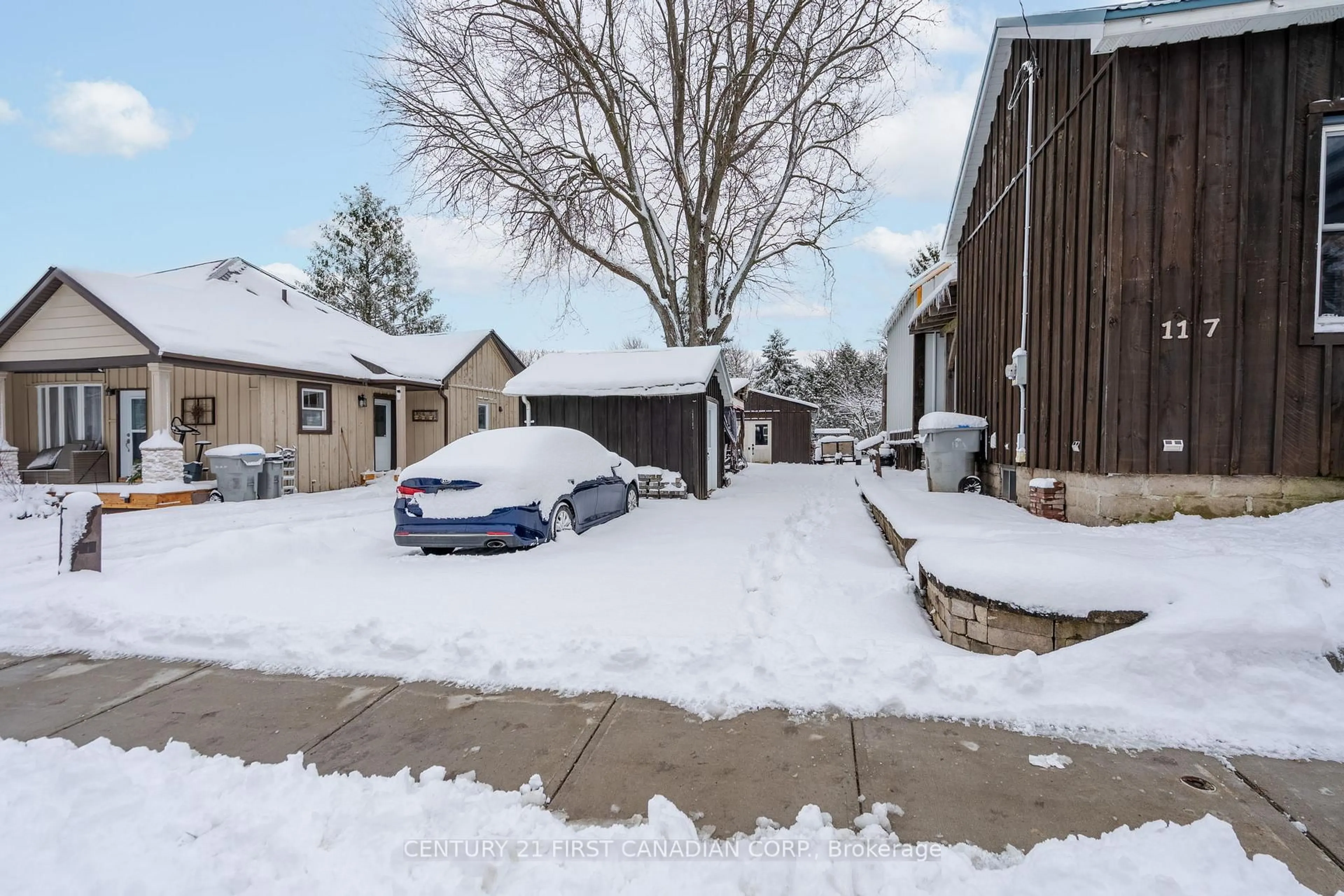 A pic from outside/outdoor area/front of a property/back of a property/a pic from drone, street for 117 Alice St, Lucan Biddulph Ontario N0M 2J0