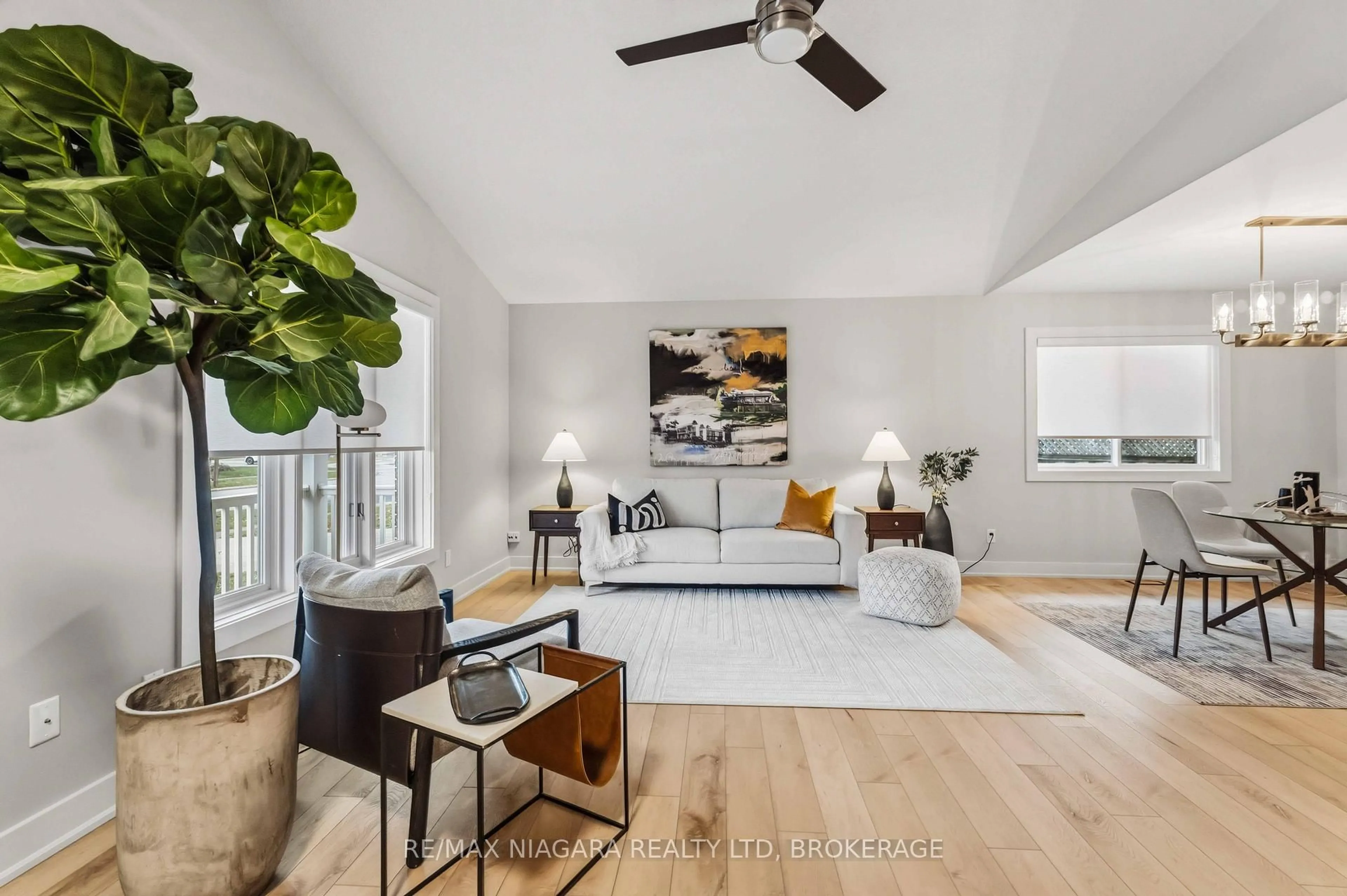 Living room with furniture, wood/laminate floor for 200 FIRST ST LOUTH St, St. Catharines Ontario L2S 2R6