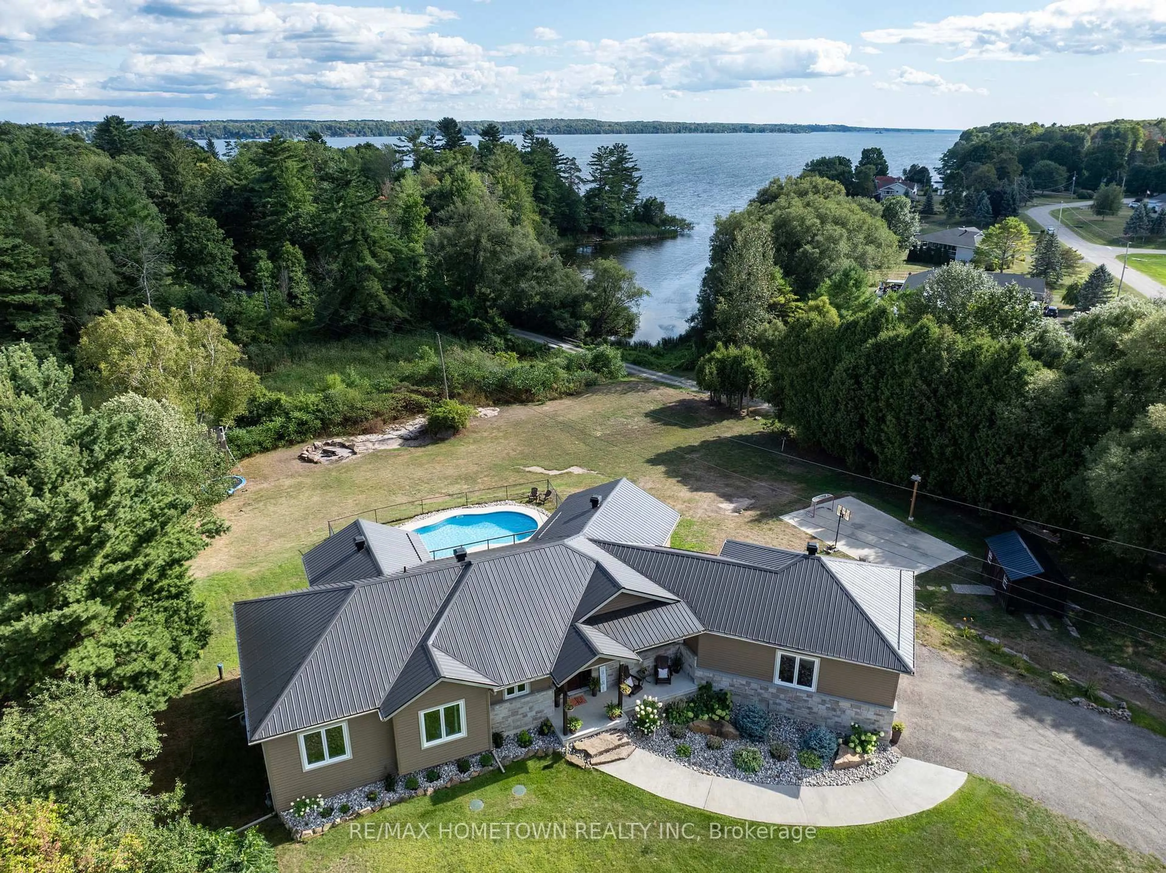 A pic from outside/outdoor area/front of a property/back of a property/a pic from drone, water/lake/river/ocean view for 303 OLD LILY BAY Rd, Elizabethtown-Kitley Ontario K6V 5T3
