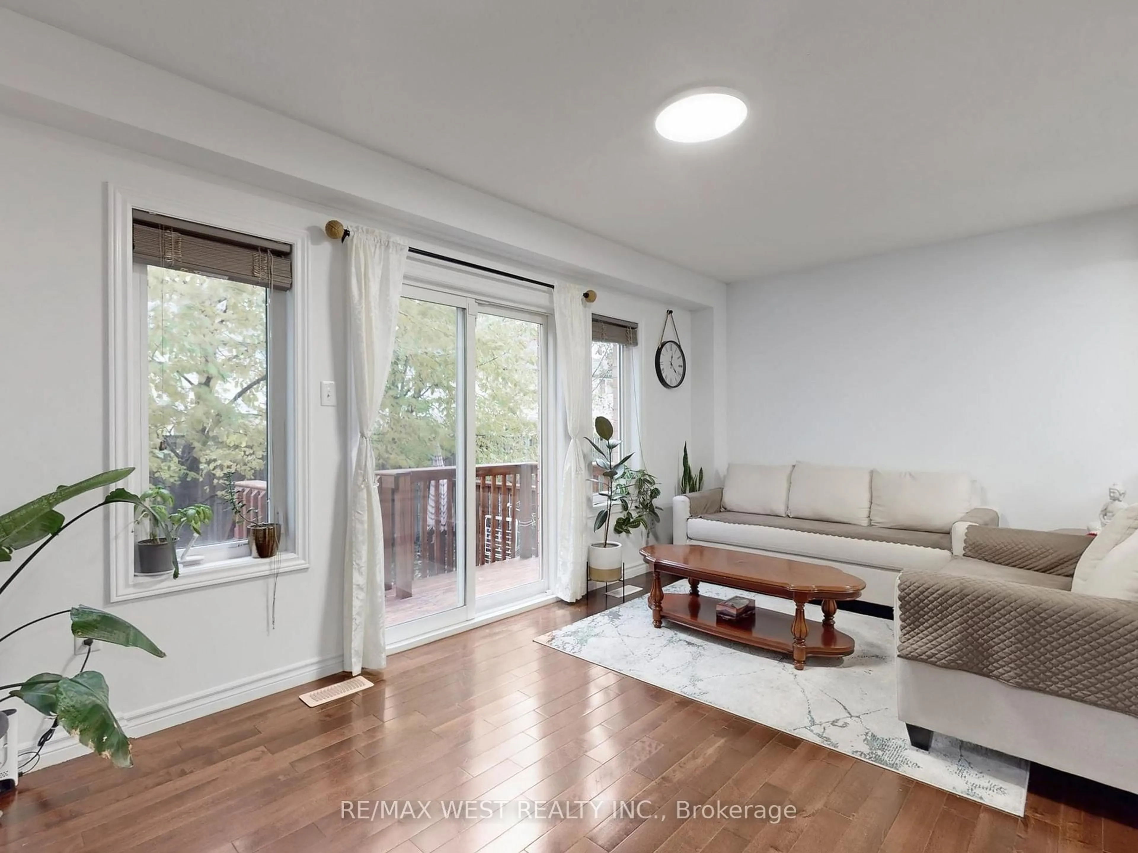 Living room with furniture, wood/laminate floor for 32 Lambeth Way #15, Guelph Ontario N1L 0H1