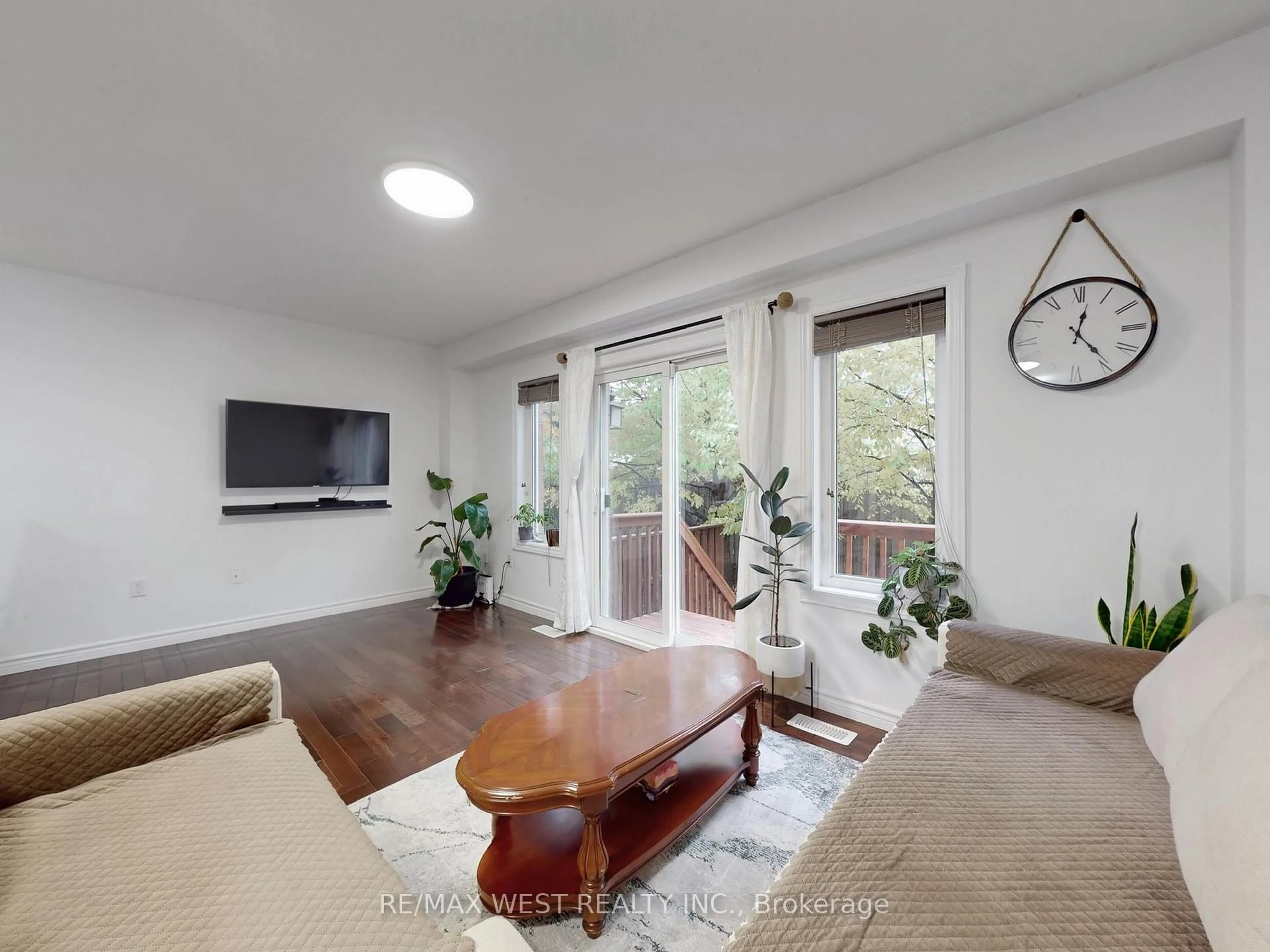 Living room with furniture, wood/laminate floor for 32 Lambeth Way #15, Guelph Ontario N1L 0H1