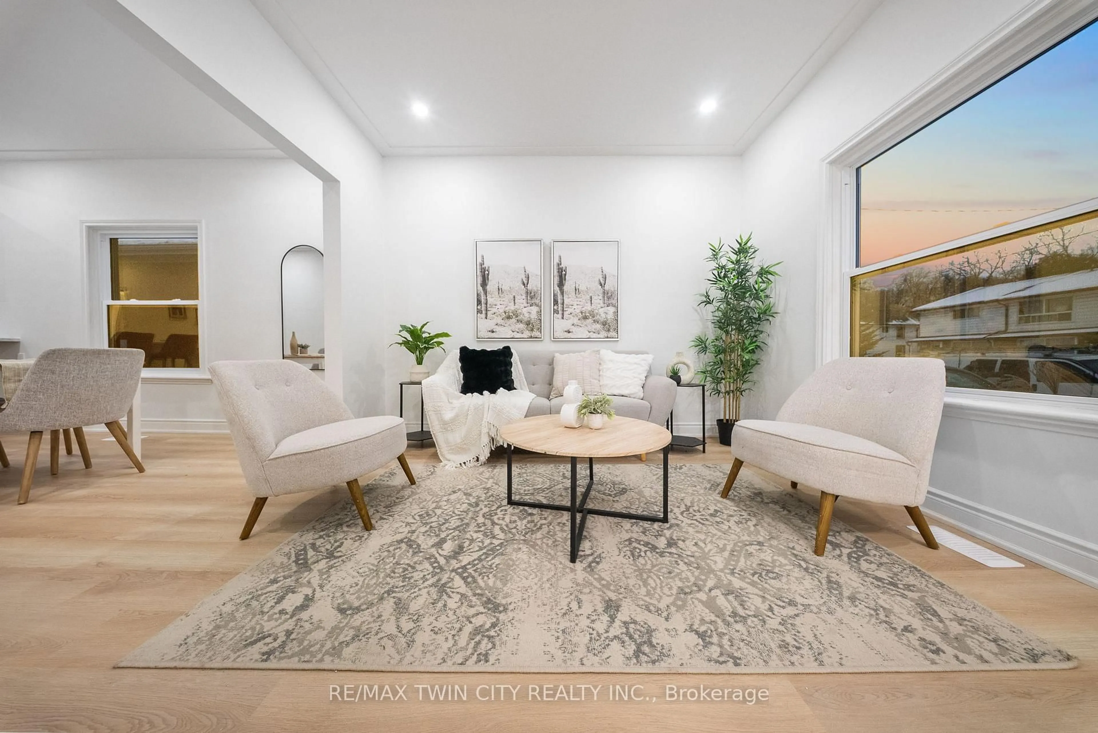 Living room with furniture, ceramic/tile floor for 12 Carlyle St, Brantford Ontario N3T 2C1