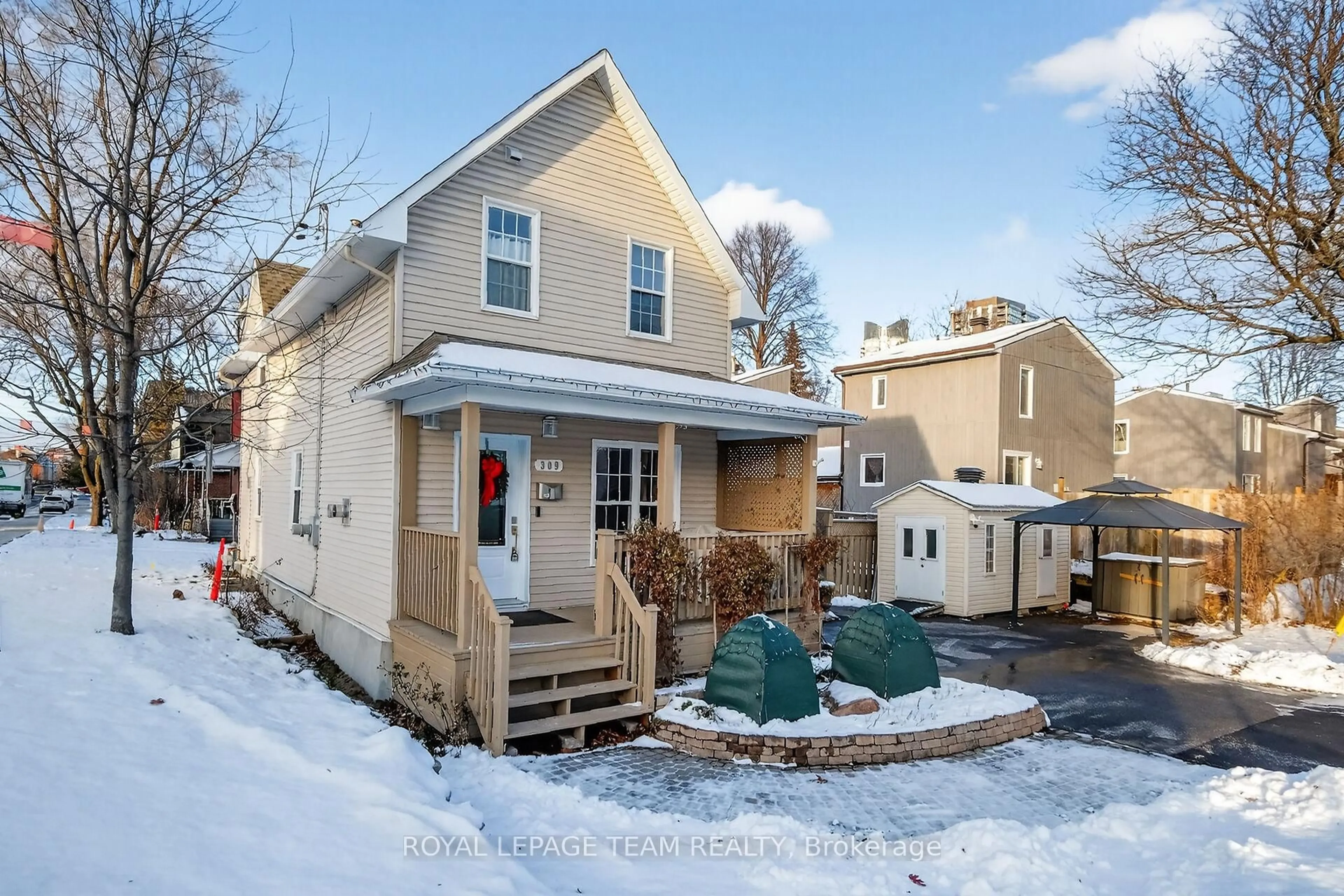 Home with vinyl exterior material, street for 309 Elmgrove Ave, Ottawa Ontario K1Z 6V2