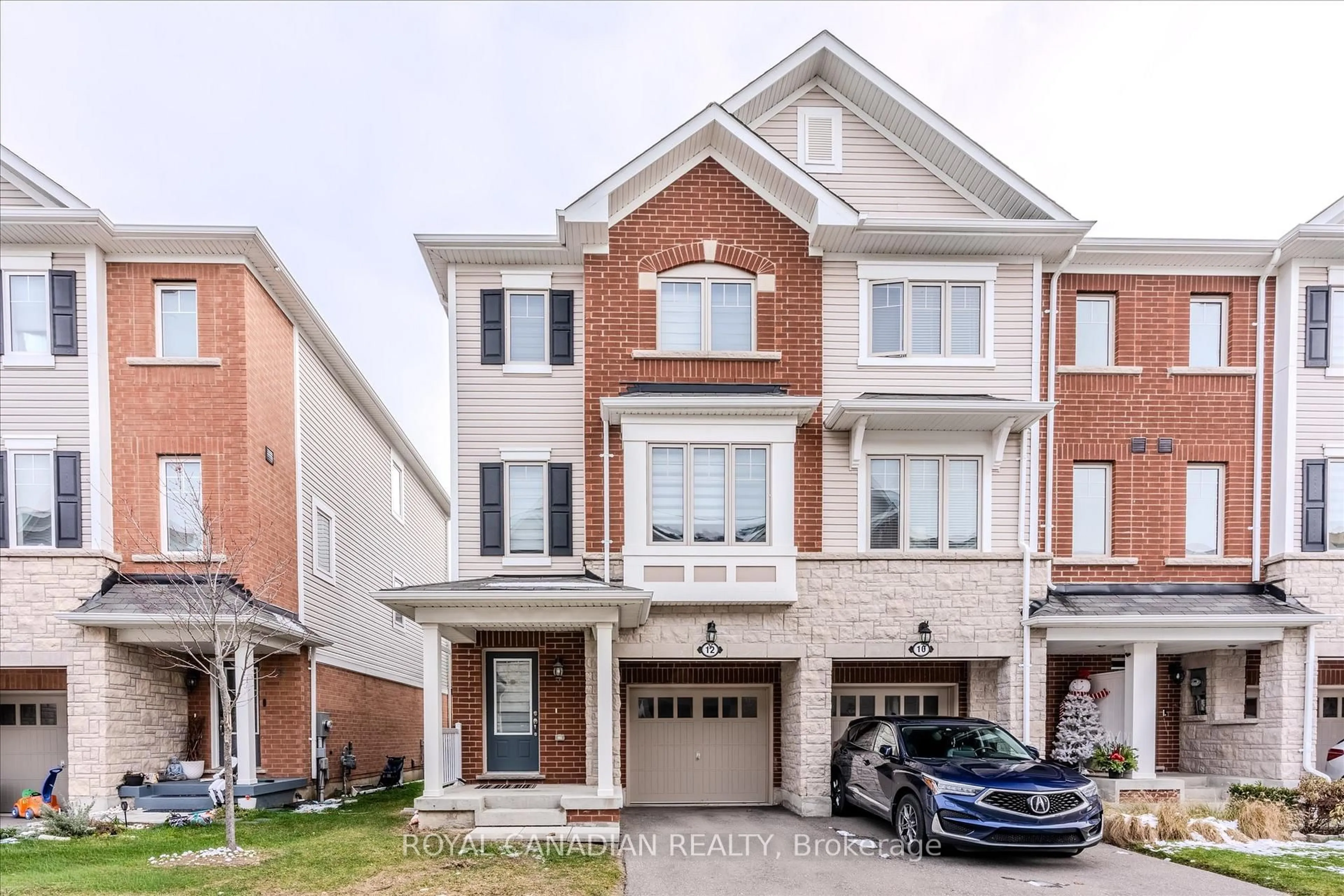 Home with brick exterior material, street for 12 Rapids Lane, Hamilton Ontario L8K 0A3