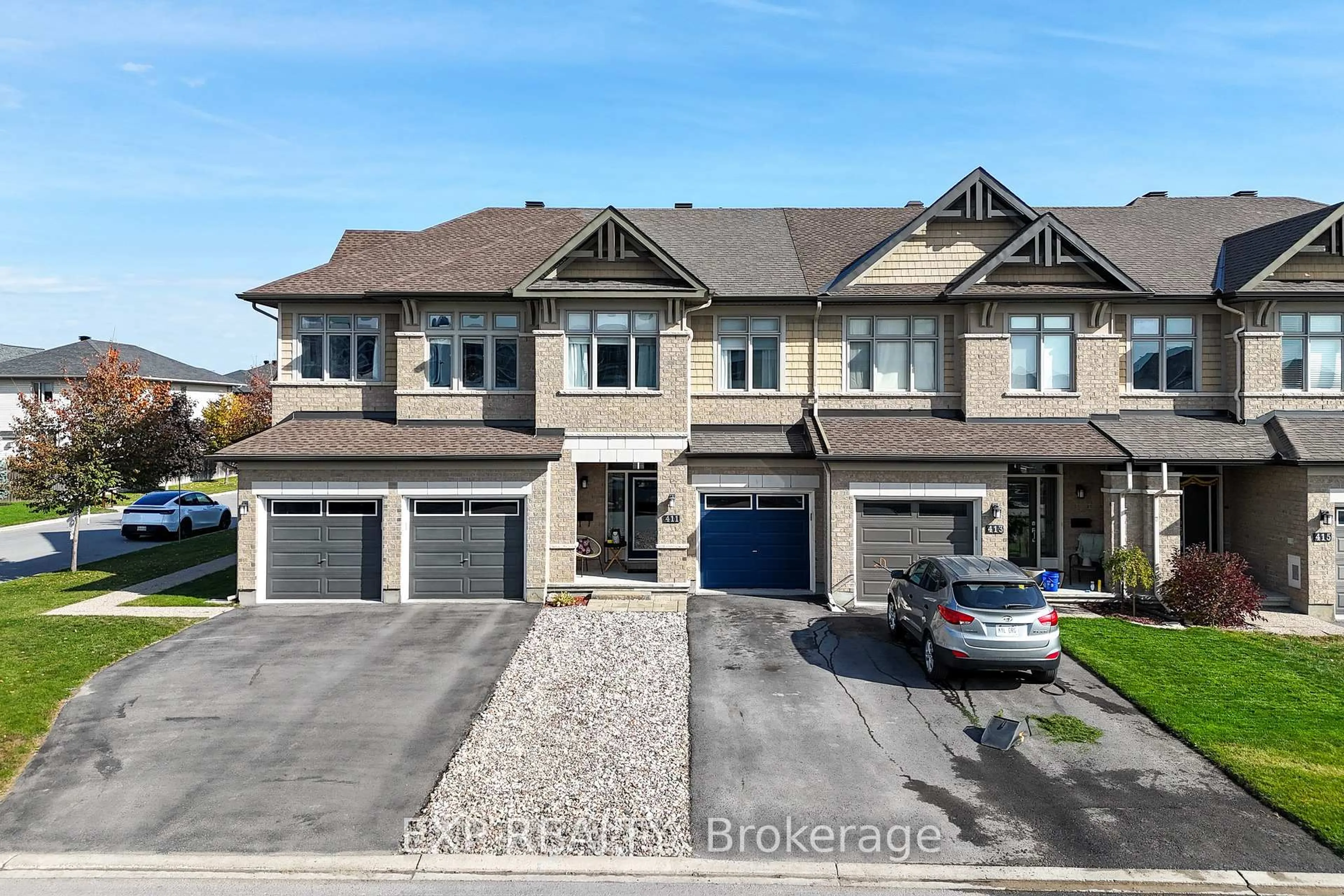 A pic from outside/outdoor area/front of a property/back of a property/a pic from drone, street for 411 Livery St, Stittsville Ontario K2V 0B5