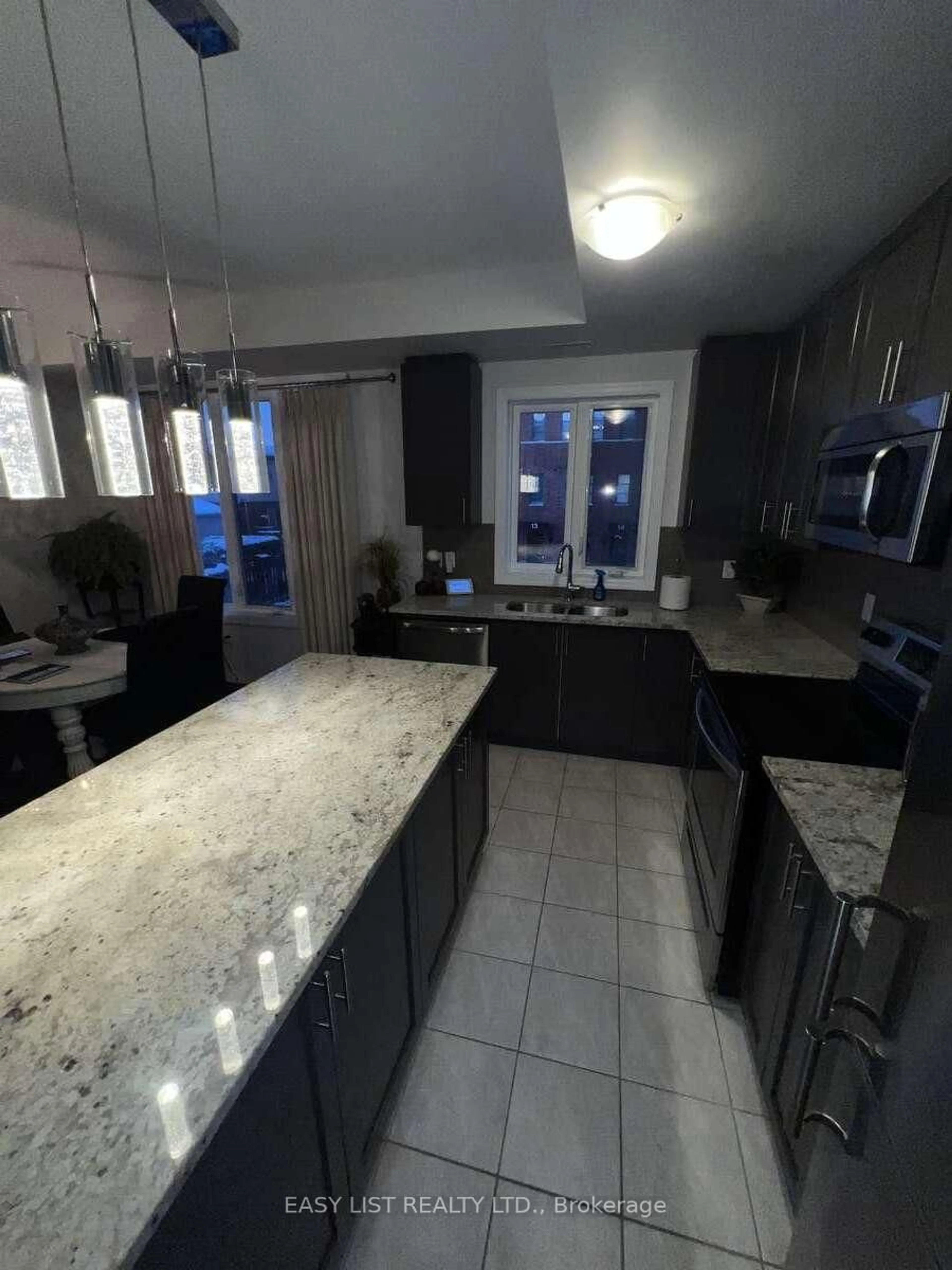 Open concept kitchen, ceramic/tile floor for 290 Barton St #3, Hamilton Ontario L8R 3P3