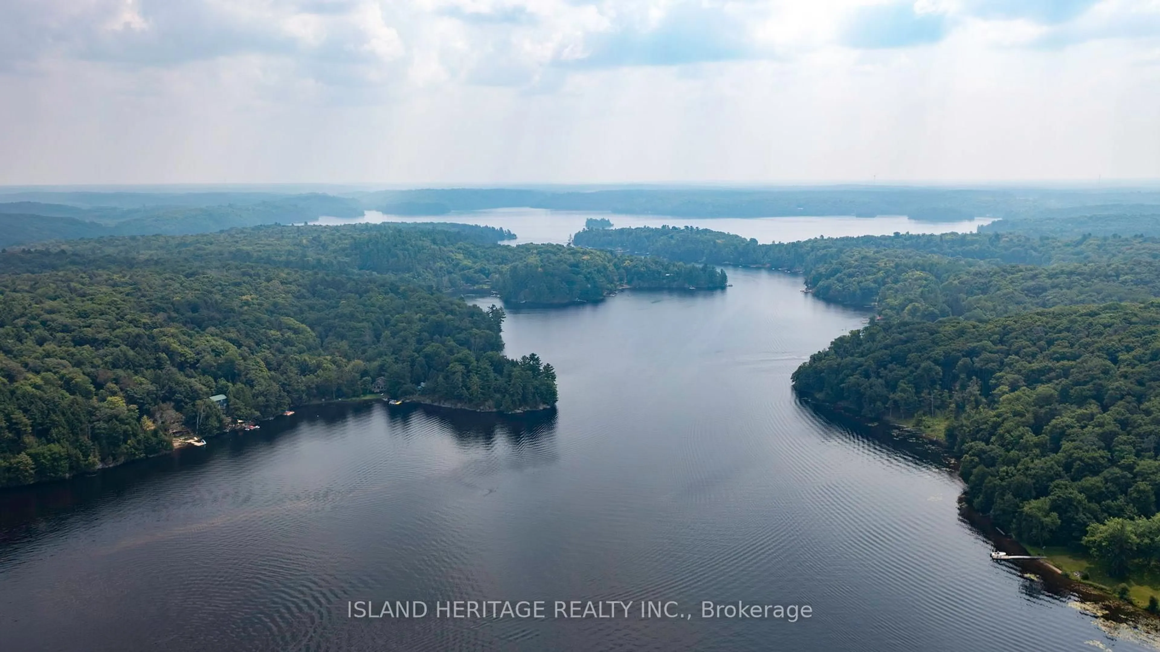 A pic from outside/outdoor area/front of a property/back of a property/a pic from drone, water/lake/river/ocean view for 5 Linney Lane, McDougall Ontario P2A 2W9