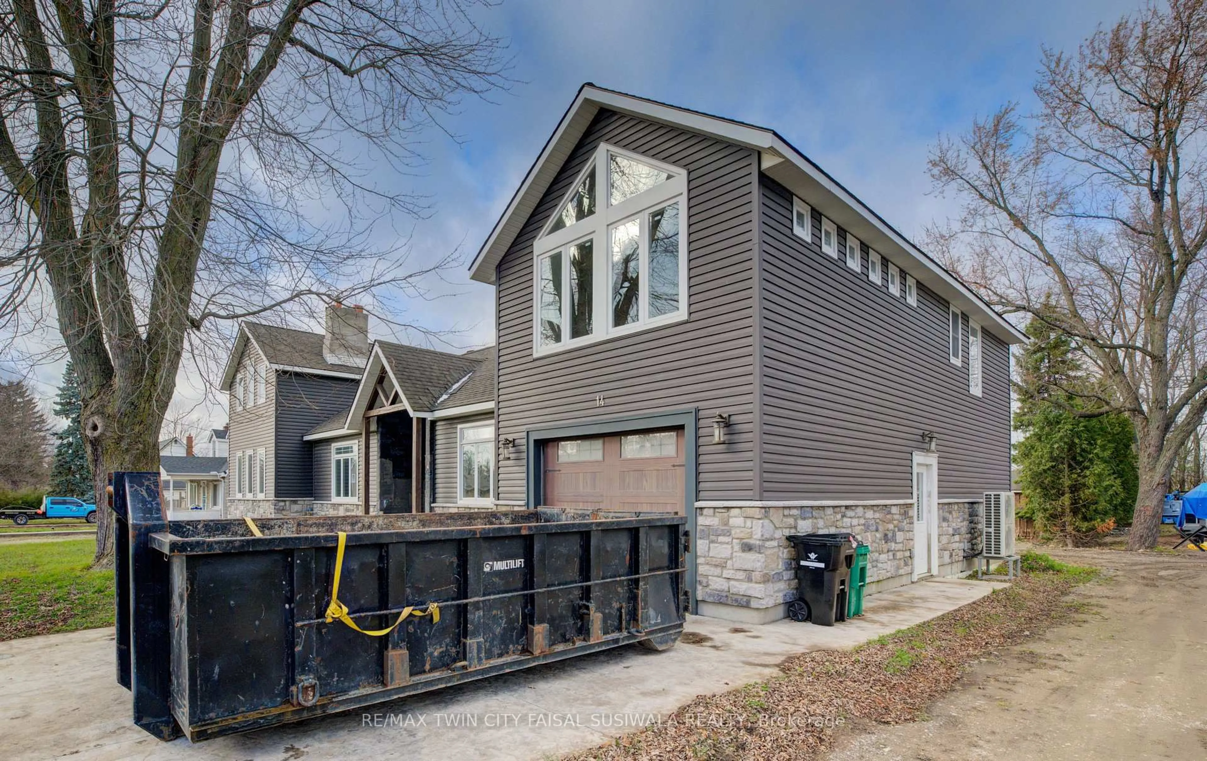 Home with brick exterior material, street for 14 Athlone Rd, Cambridge Ontario N1R 1H8