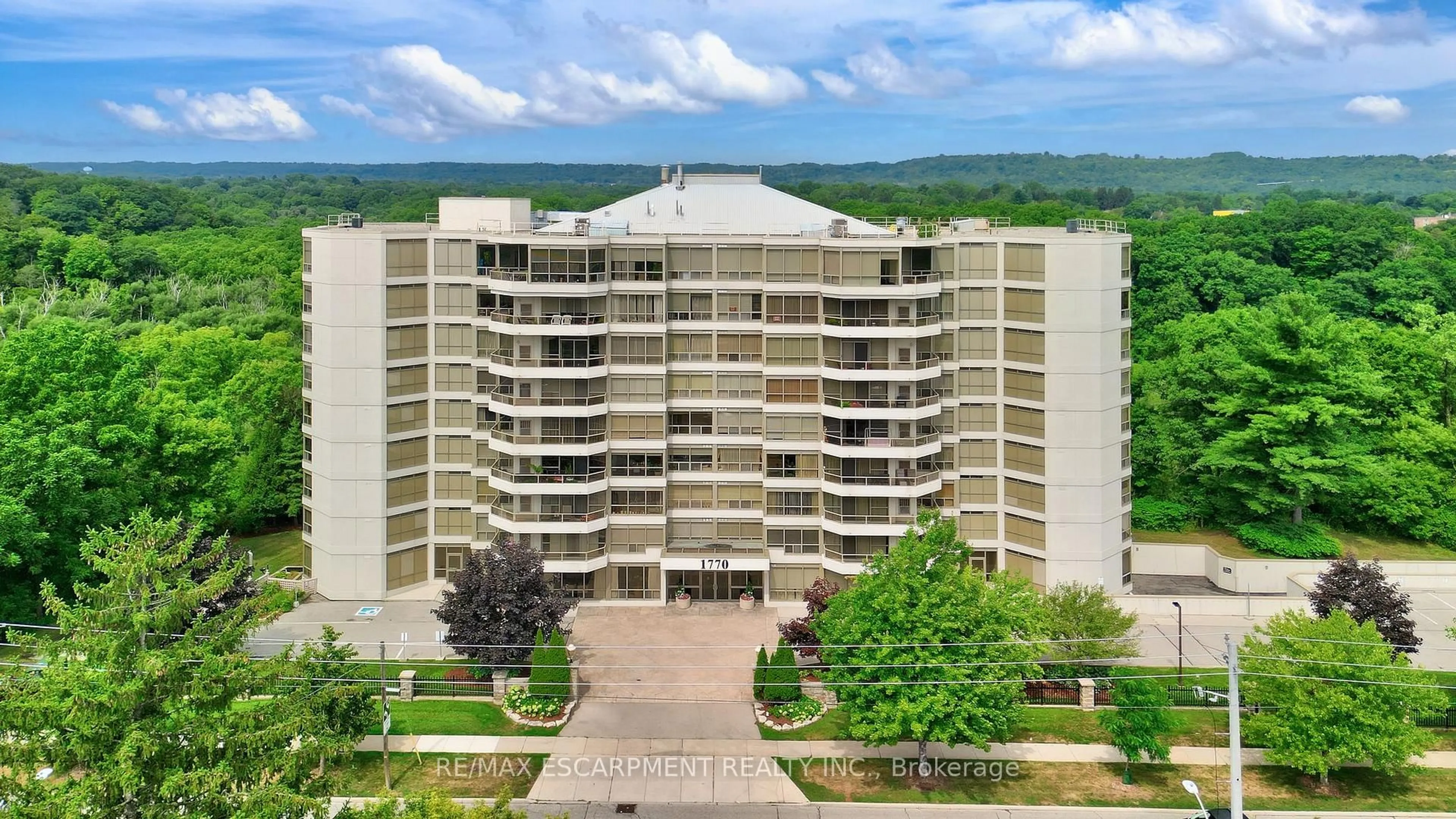A pic from outside/outdoor area/front of a property/back of a property/a pic from drone, building for 1770 Main St #506, Hamilton Ontario L8S 1H1