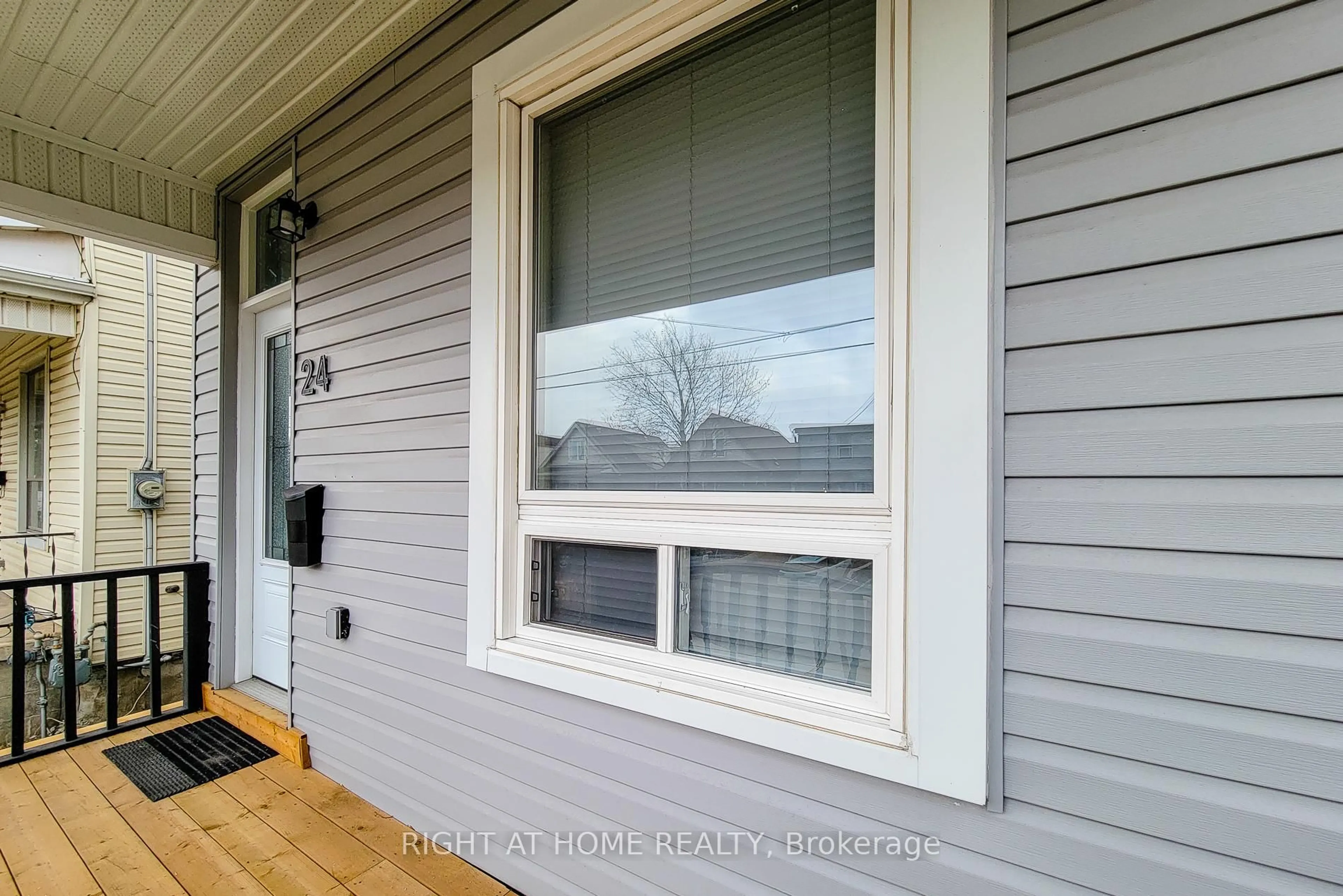 Home with vinyl exterior material, street for 24 Albemarle St, Hamilton Ontario L8L 7G4