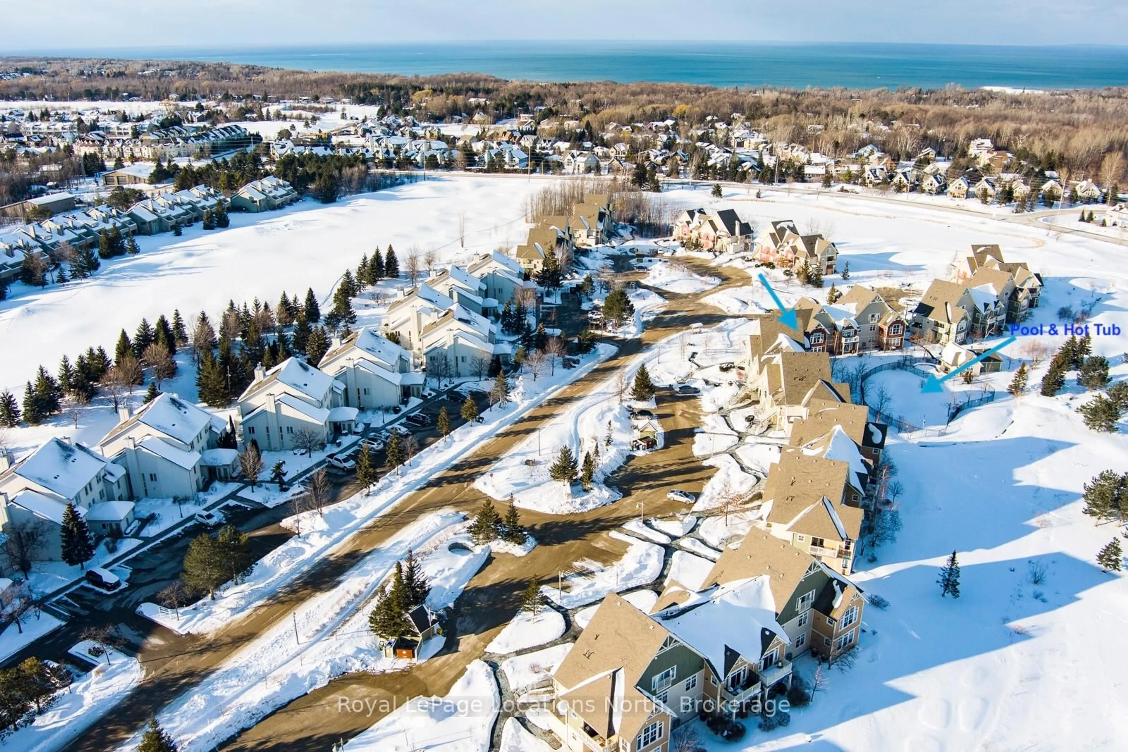 A pic from outside/outdoor area/front of a property/back of a property/a pic from drone, water/lake/river/ocean view for 125 FAIRWAY Crt #221, Blue Mountains Ontario L9Y 0P8