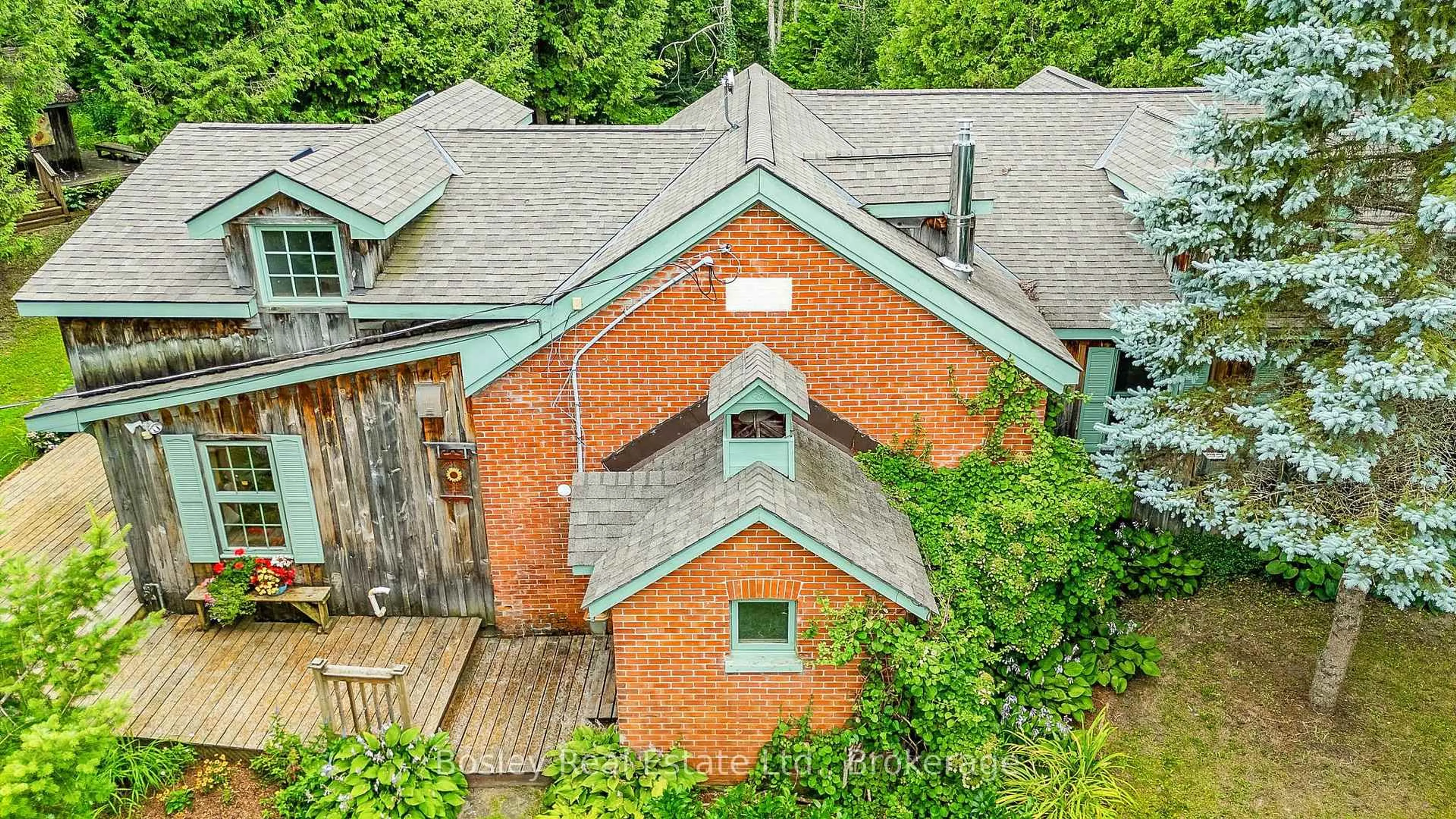 A pic from outside/outdoor area/front of a property/back of a property/a pic from drone, unknown for 355276 The Blue Mountains Euphrasia Townline, Blue Mountains Ontario N0H 1J0