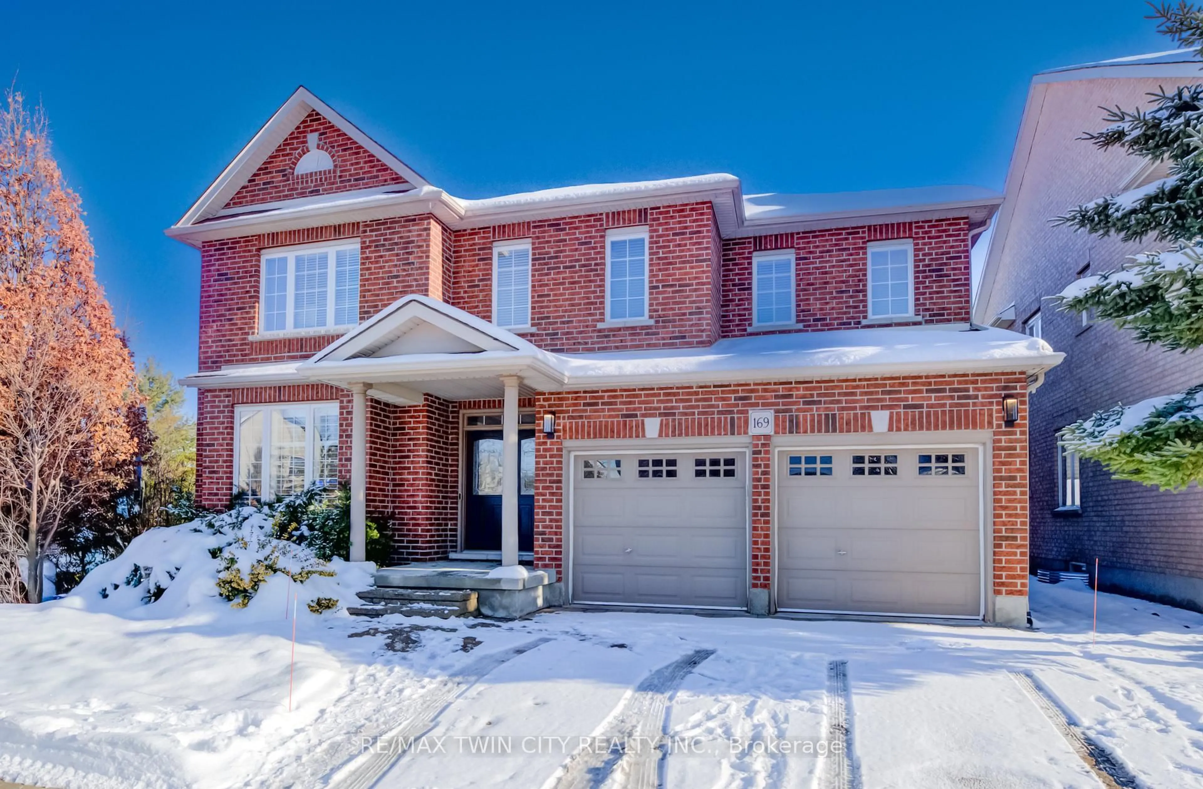 Home with brick exterior material, street for 169 Falconridge Dr, Kitchener Ontario N2K 4J9