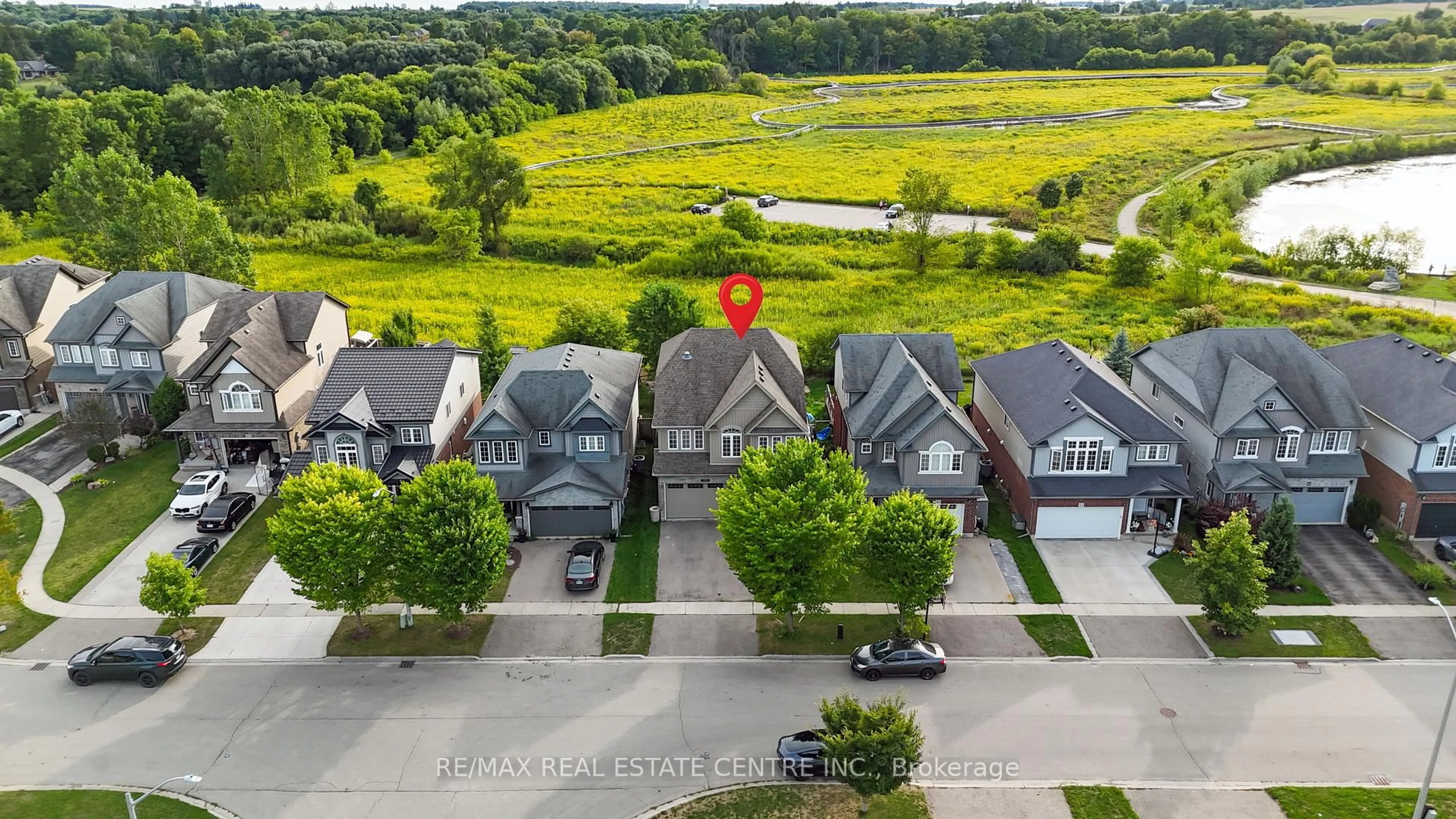 A pic from outside/outdoor area/front of a property/back of a property/a pic from drone, street for 56 Smith's Creek Dr, Wilmot Ontario N3A 0B3