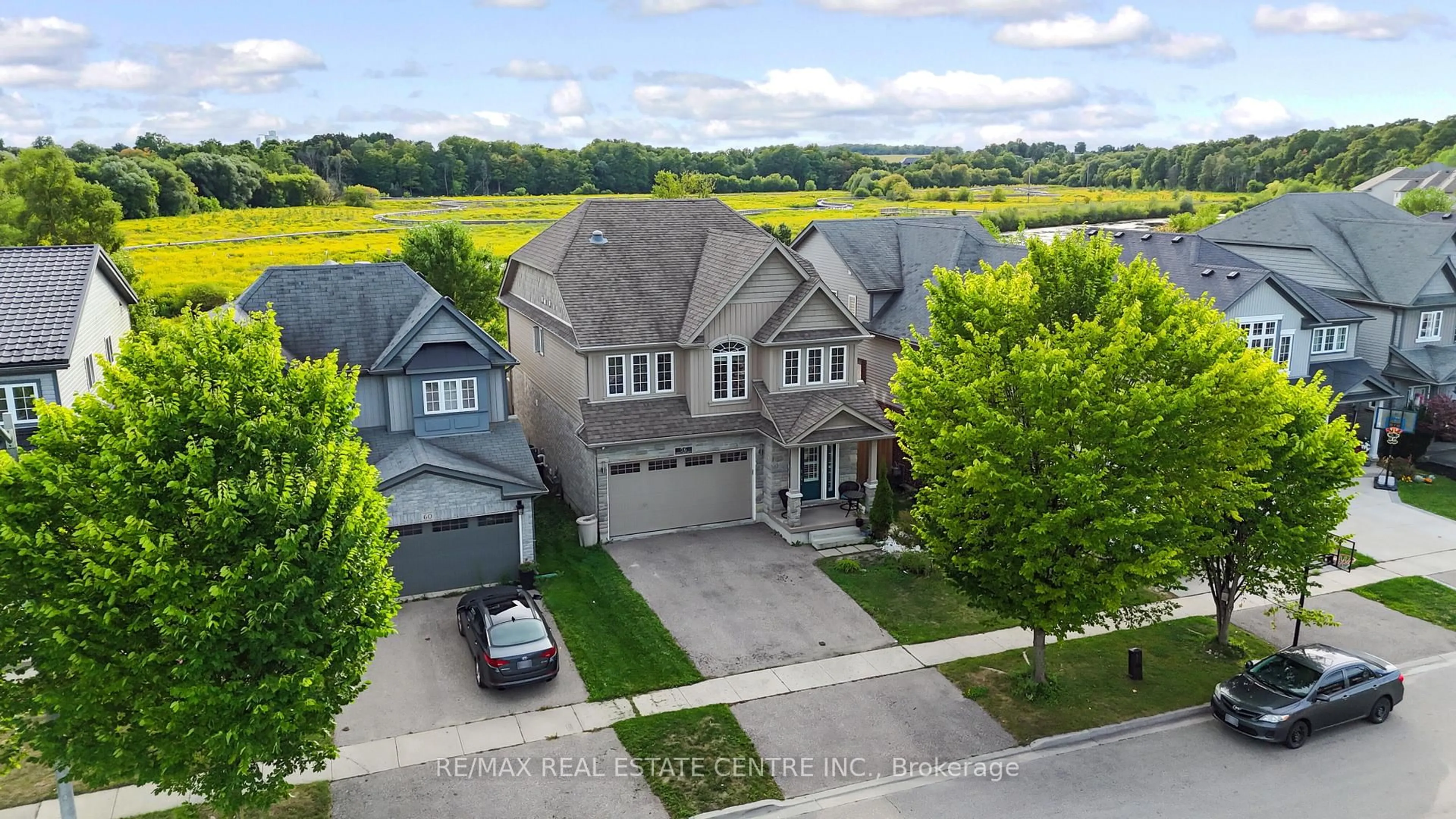 A pic from outside/outdoor area/front of a property/back of a property/a pic from drone, street for 56 Smith's Creek Dr, Wilmot Ontario N3A 0B3