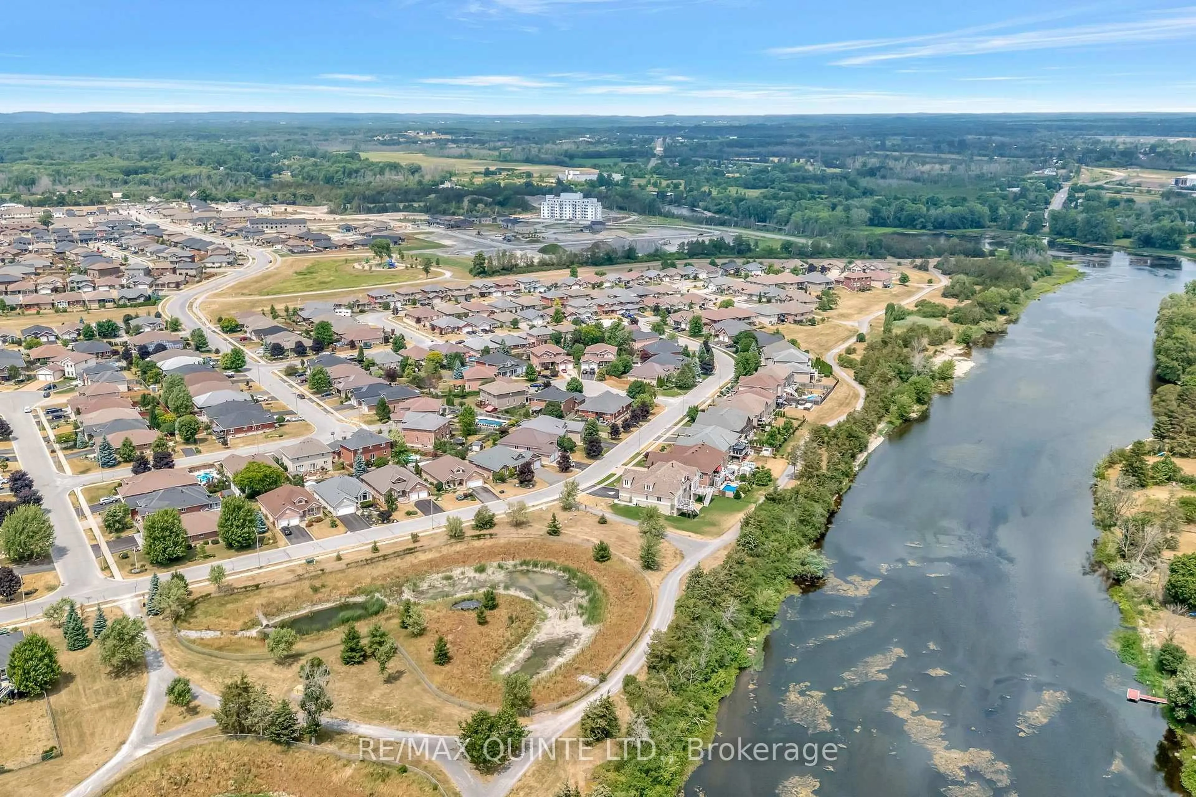 A pic from outside/outdoor area/front of a property/back of a property/a pic from drone, water/lake/river/ocean view for 7 Chestnut Dr, Belleville Ontario K8N 0M9