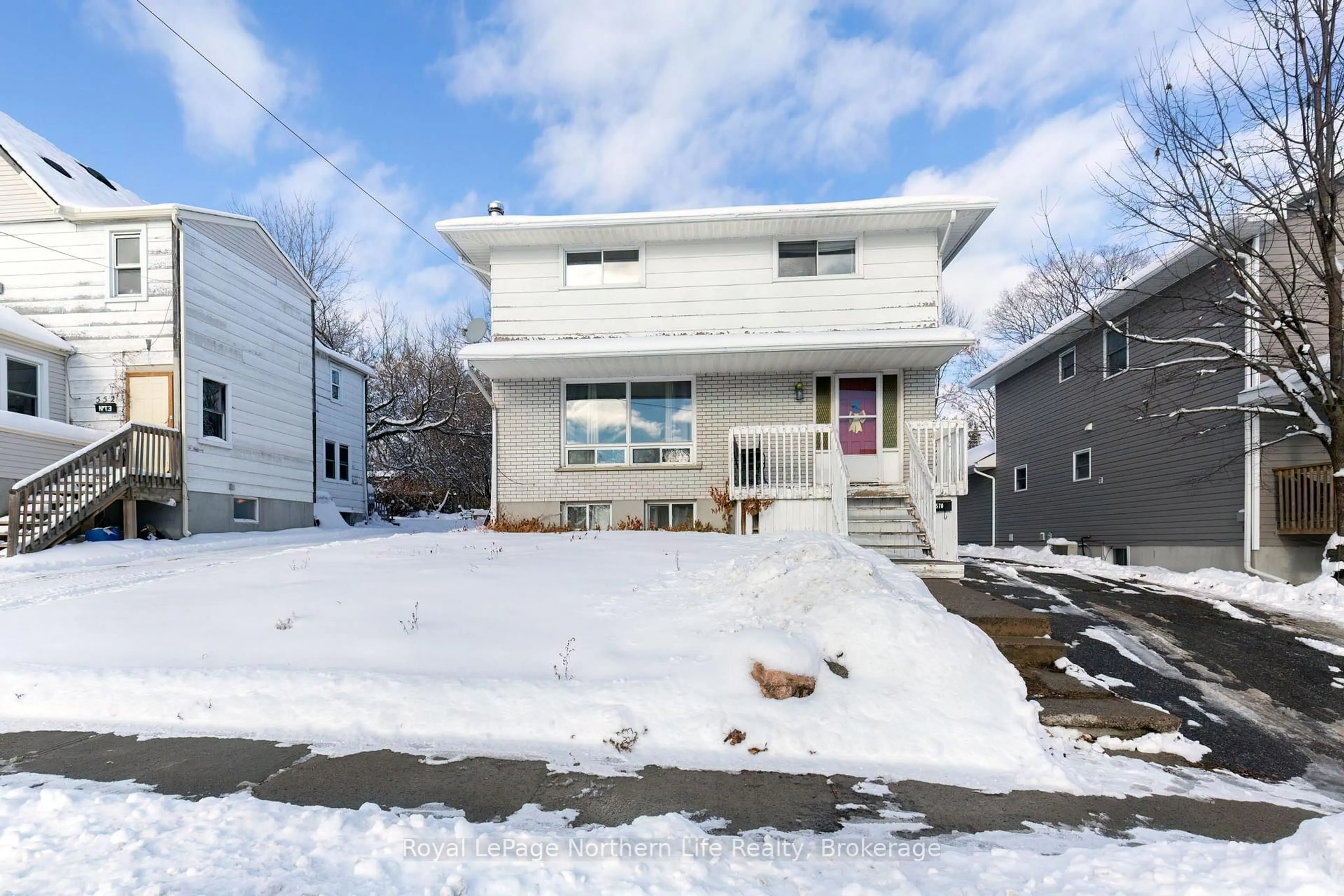 Home with vinyl exterior material, street for 570 High St, North Bay Ontario P1B 6R6