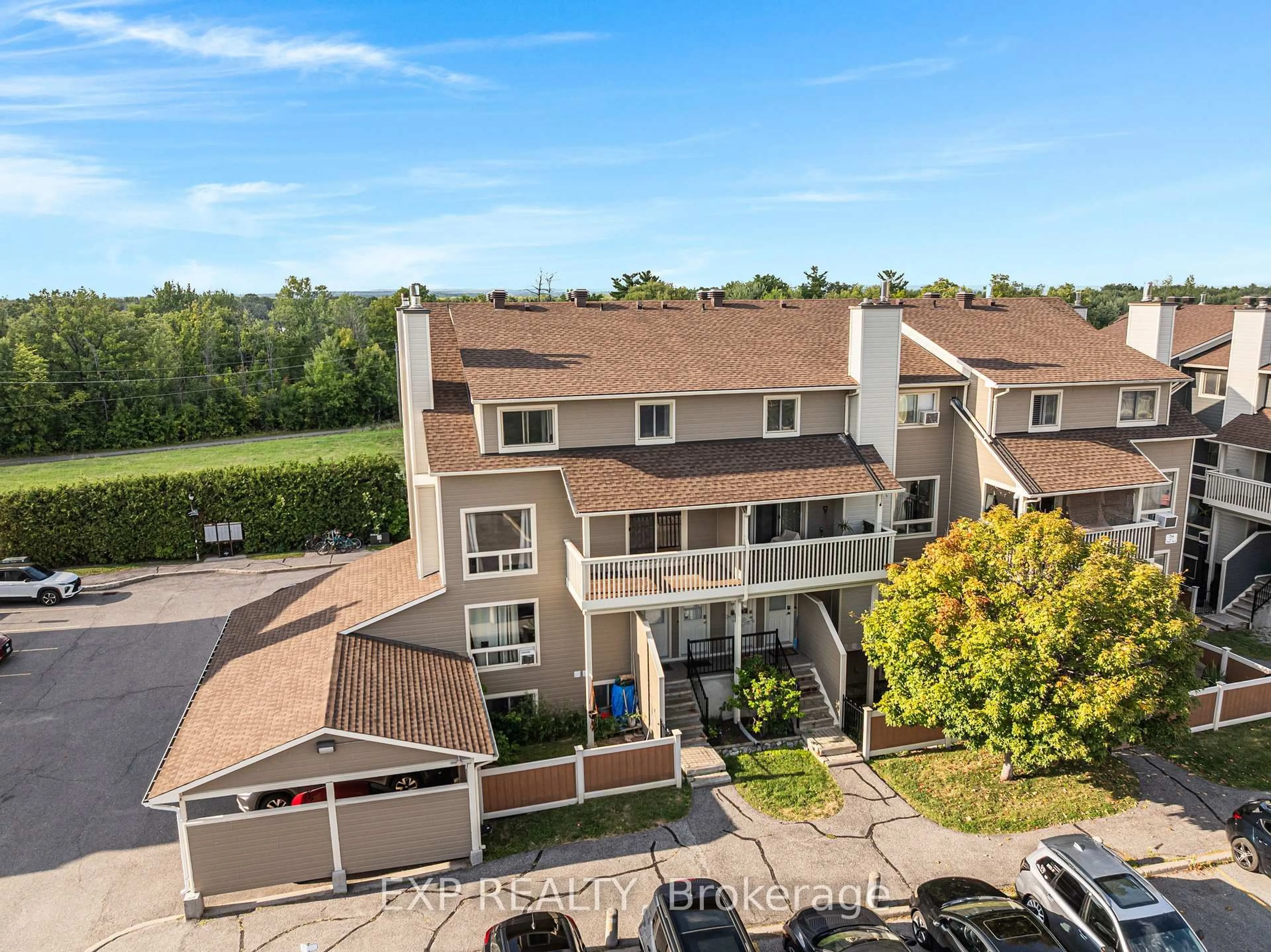 A pic from outside/outdoor area/front of a property/back of a property/a pic from drone, unknown for 754 St. Andre Dr #77B, Orleans Ontario K1C 4S4