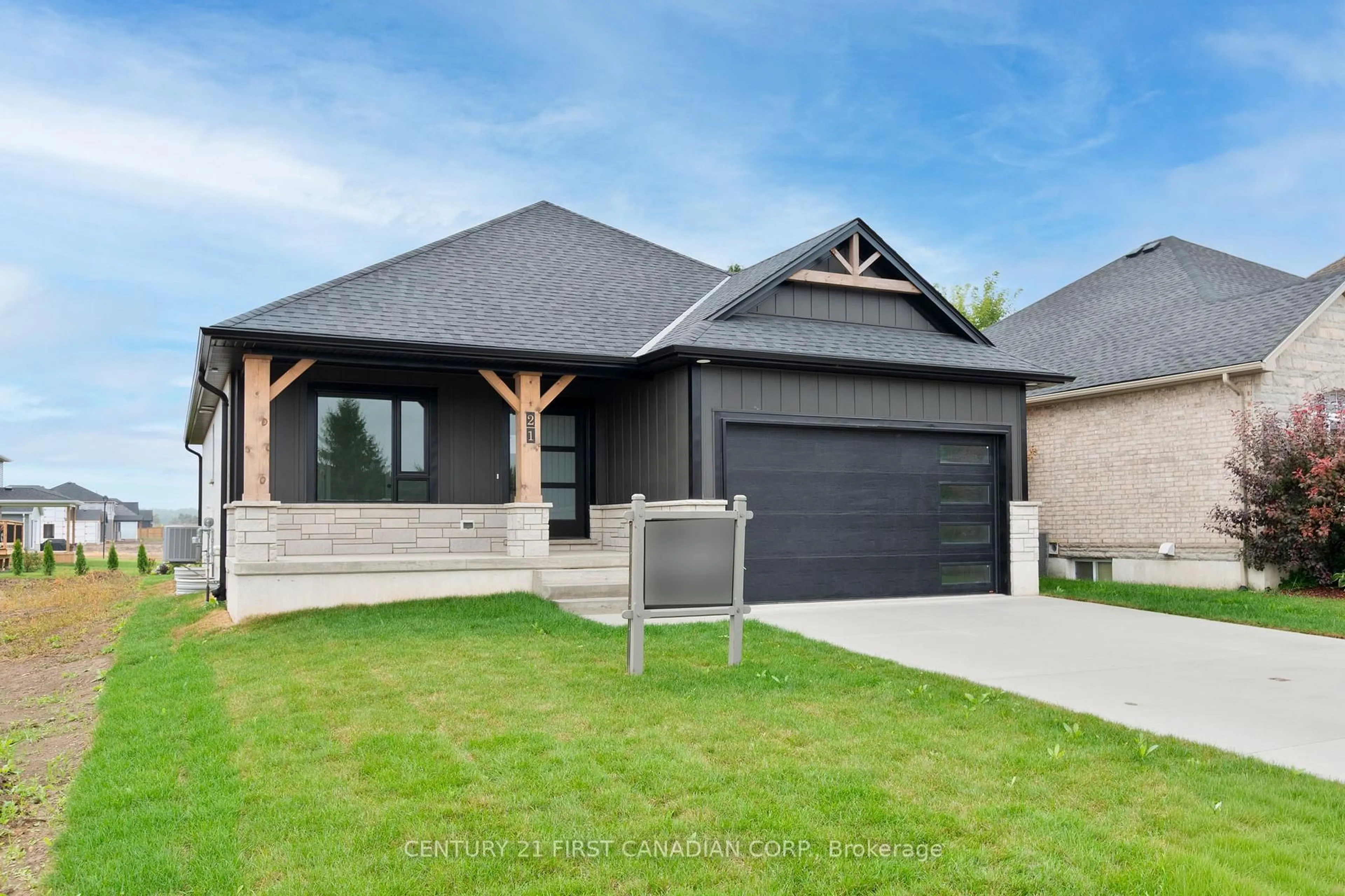 Home with brick exterior material, street for 21 HAMILTON St, North Middlesex Ontario N0M 1A0