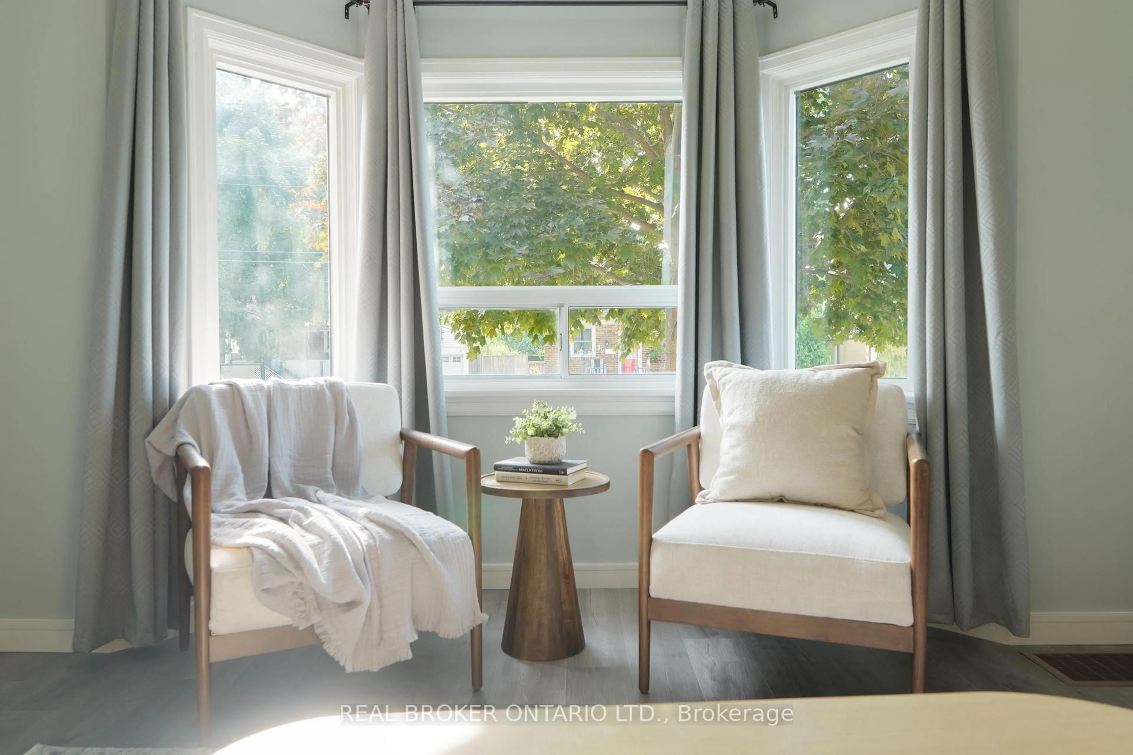 Living room with furniture, wood/laminate floor for 39 Cloverhill Rd, Hamilton Ontario L9C 3L6