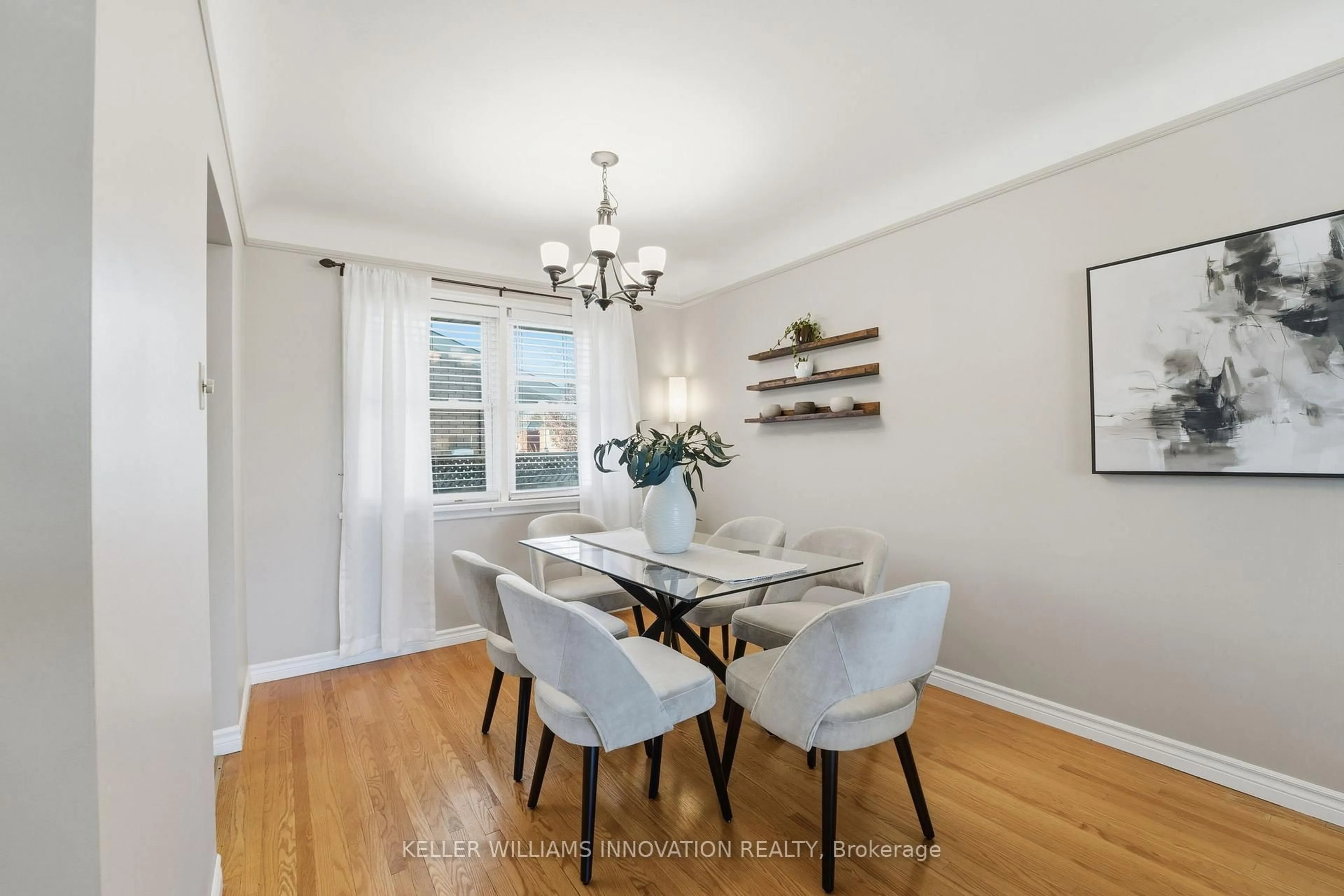 Dining room, wood/laminate floor for 11 Kensington Ave, Kitchener Ontario N2B 1J5