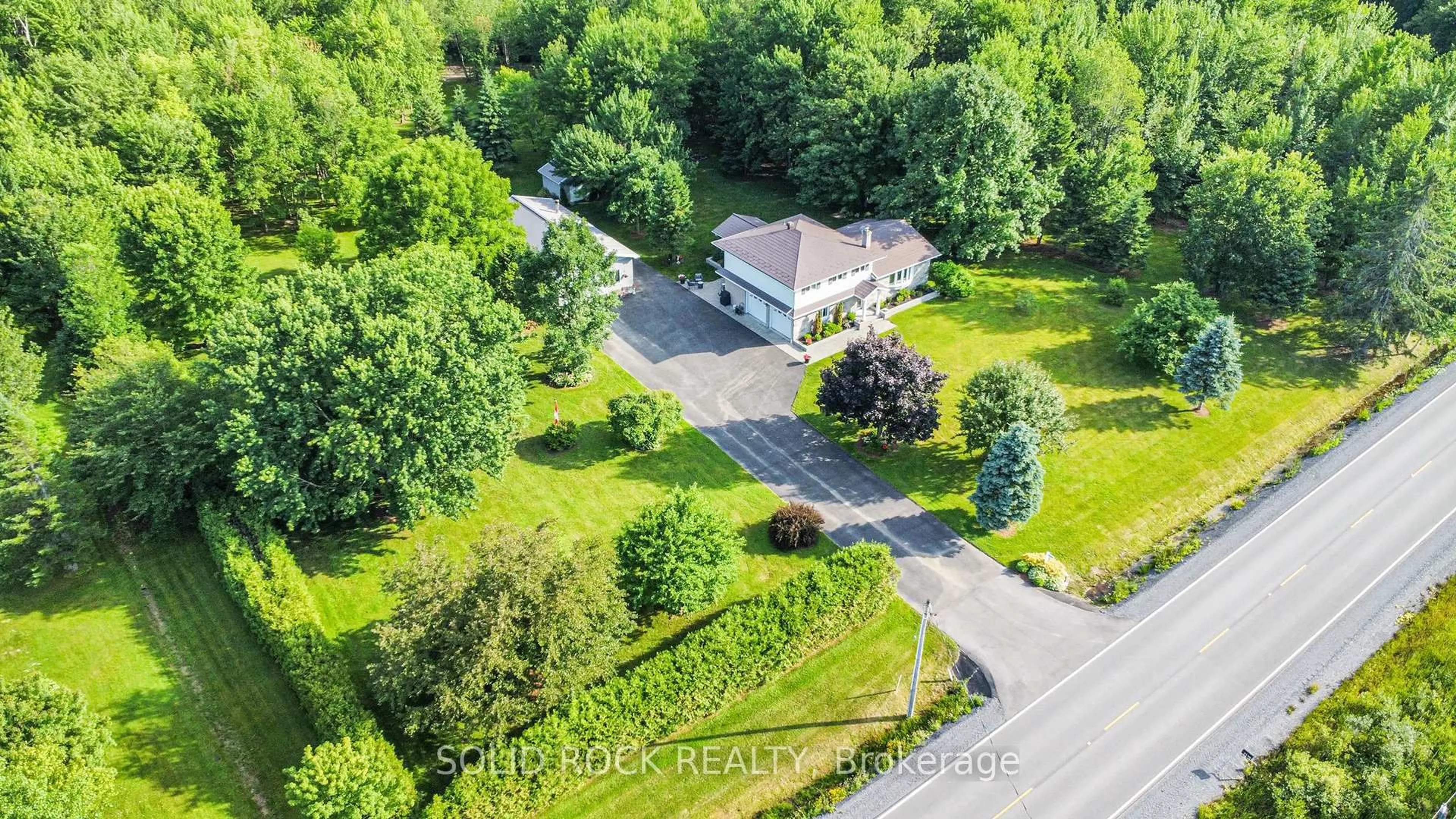 A pic from outside/outdoor area/front of a property/back of a property/a pic from drone, street for 2278 Russland Rd, Russell Ontario K0A 3H0