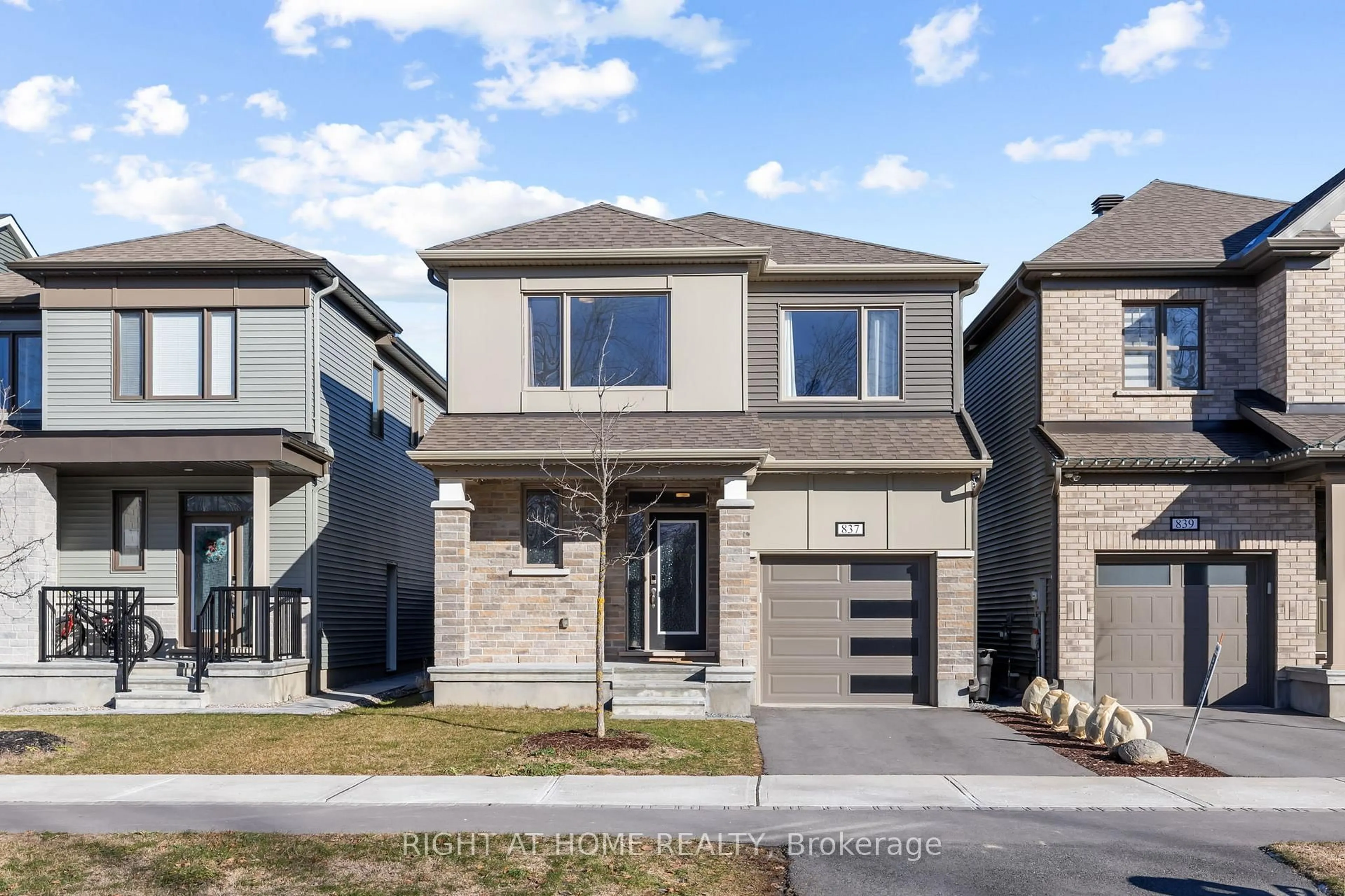Home with brick exterior material, street for 837 Derreen Ave, Stittsville Ontario K2S 3A7