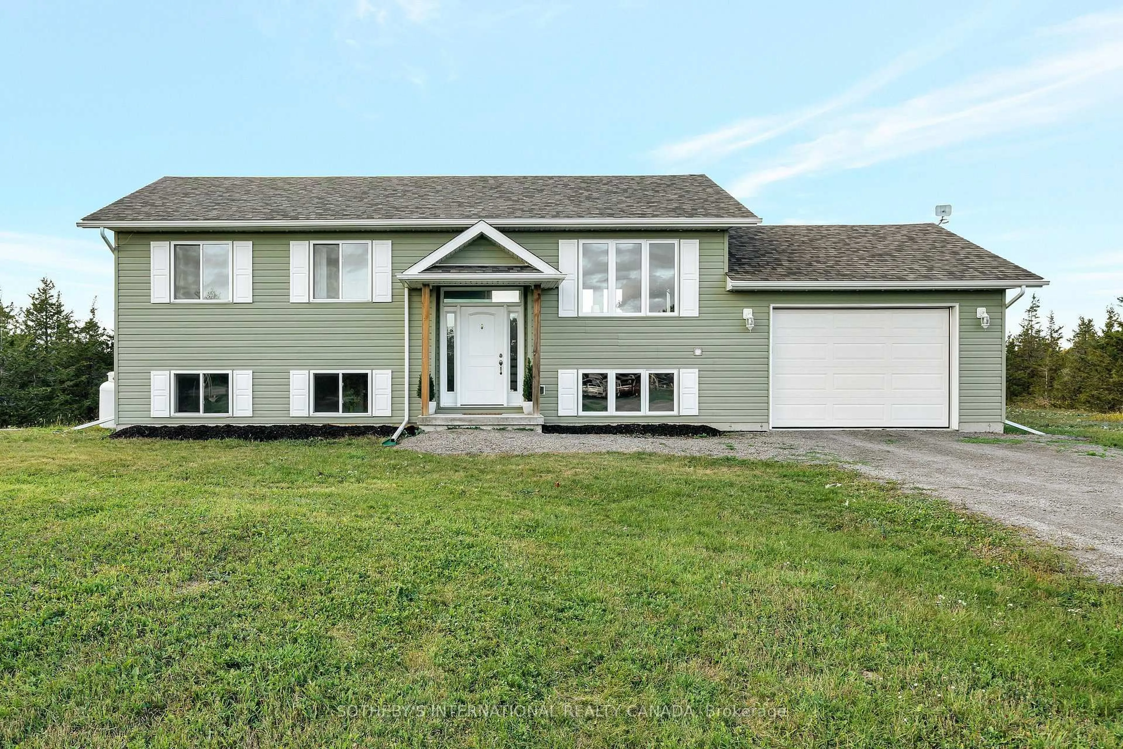 Home with vinyl exterior material, street for 158 Old Milford Rd, Prince Edward County Ontario K0K 2T0