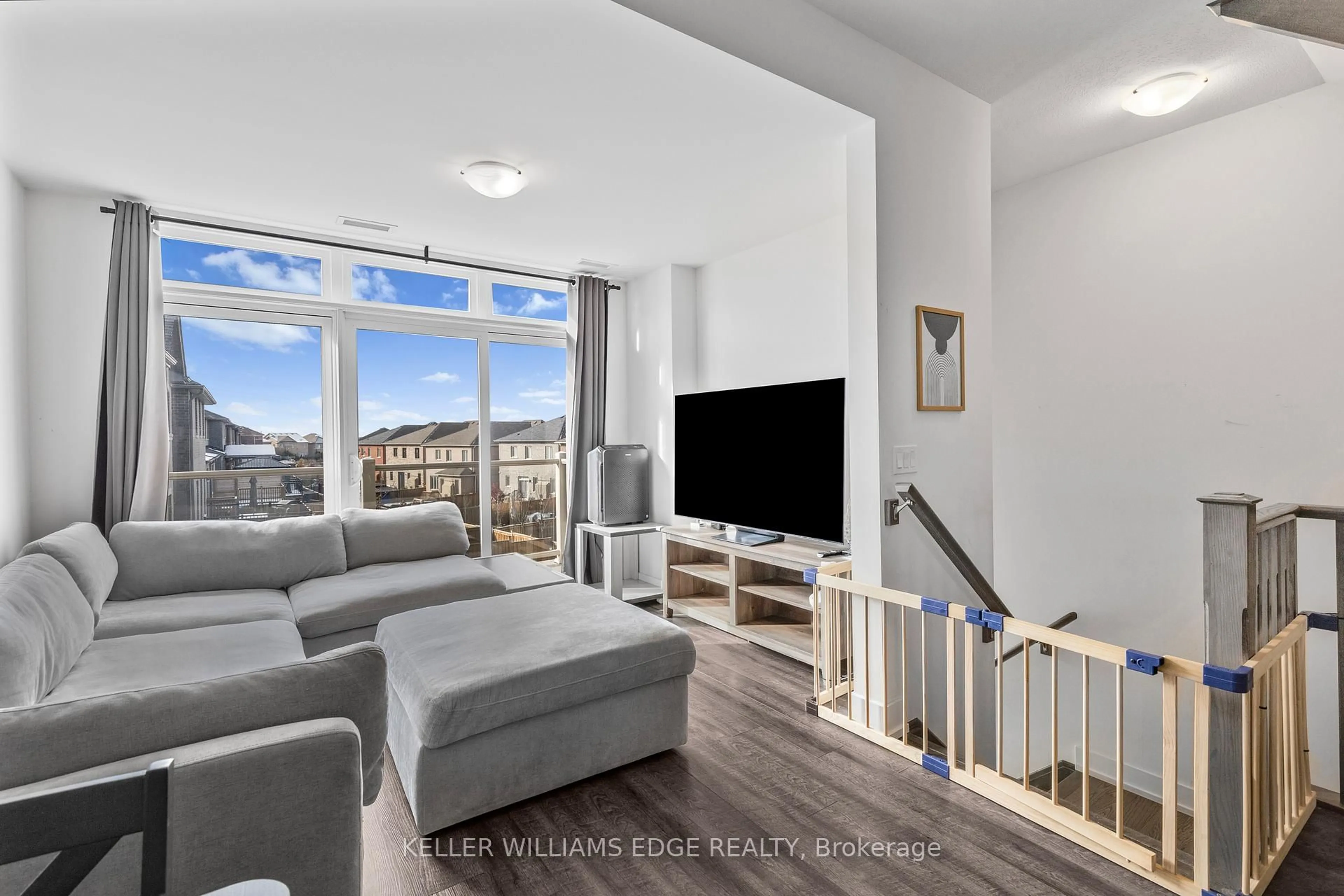 Living room with furniture, unknown for 261 Skinner Rd #16, Hamilton Ontario L8B 1W6