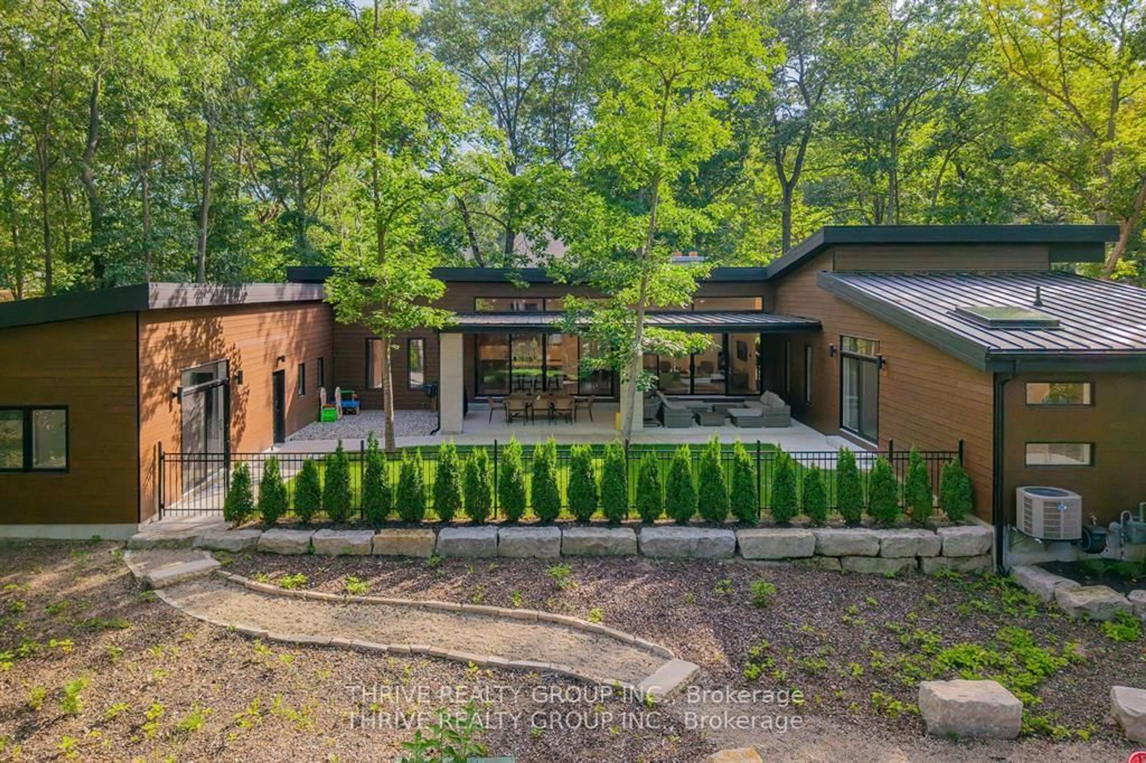 A pic from outside/outdoor area/front of a property/back of a property/a pic from drone, forest/trees view for 10107 Pinery Bluffs Rd, Lambton Shores Ontario N0M 1T0