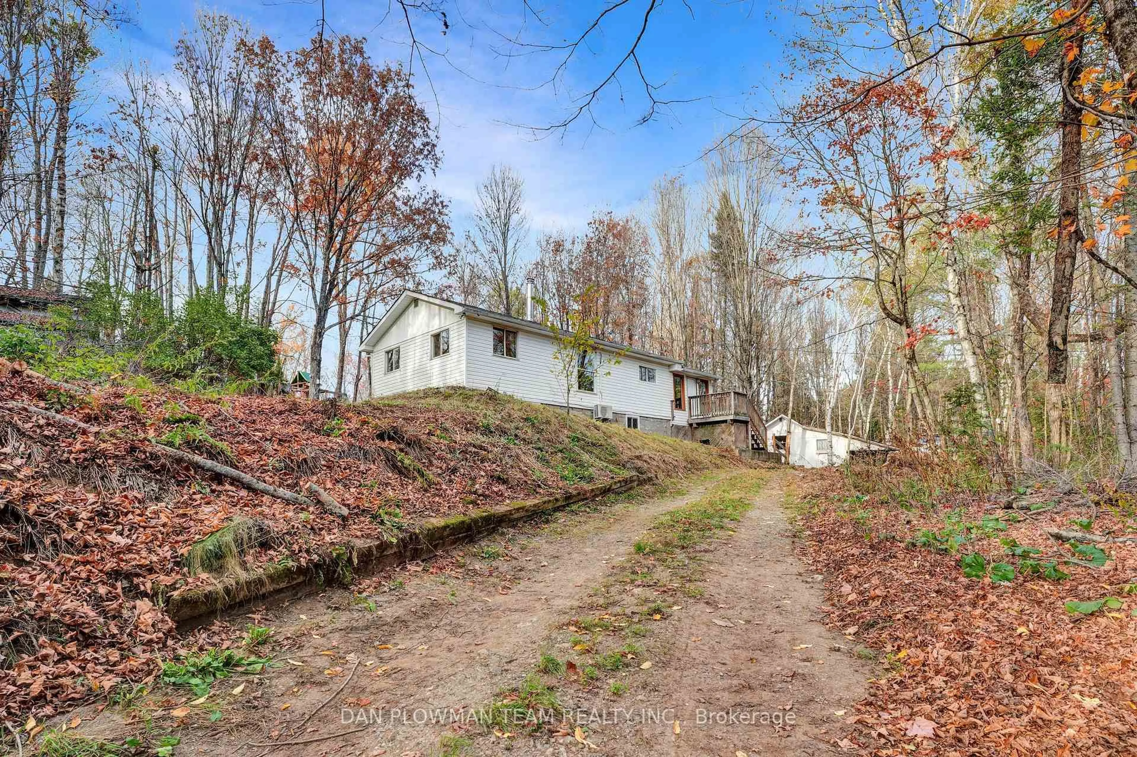 A pic from outside/outdoor area/front of a property/back of a property/a pic from drone, forest/trees view for 1919 Irondale Rd, Highlands East Ontario K0M 2A0