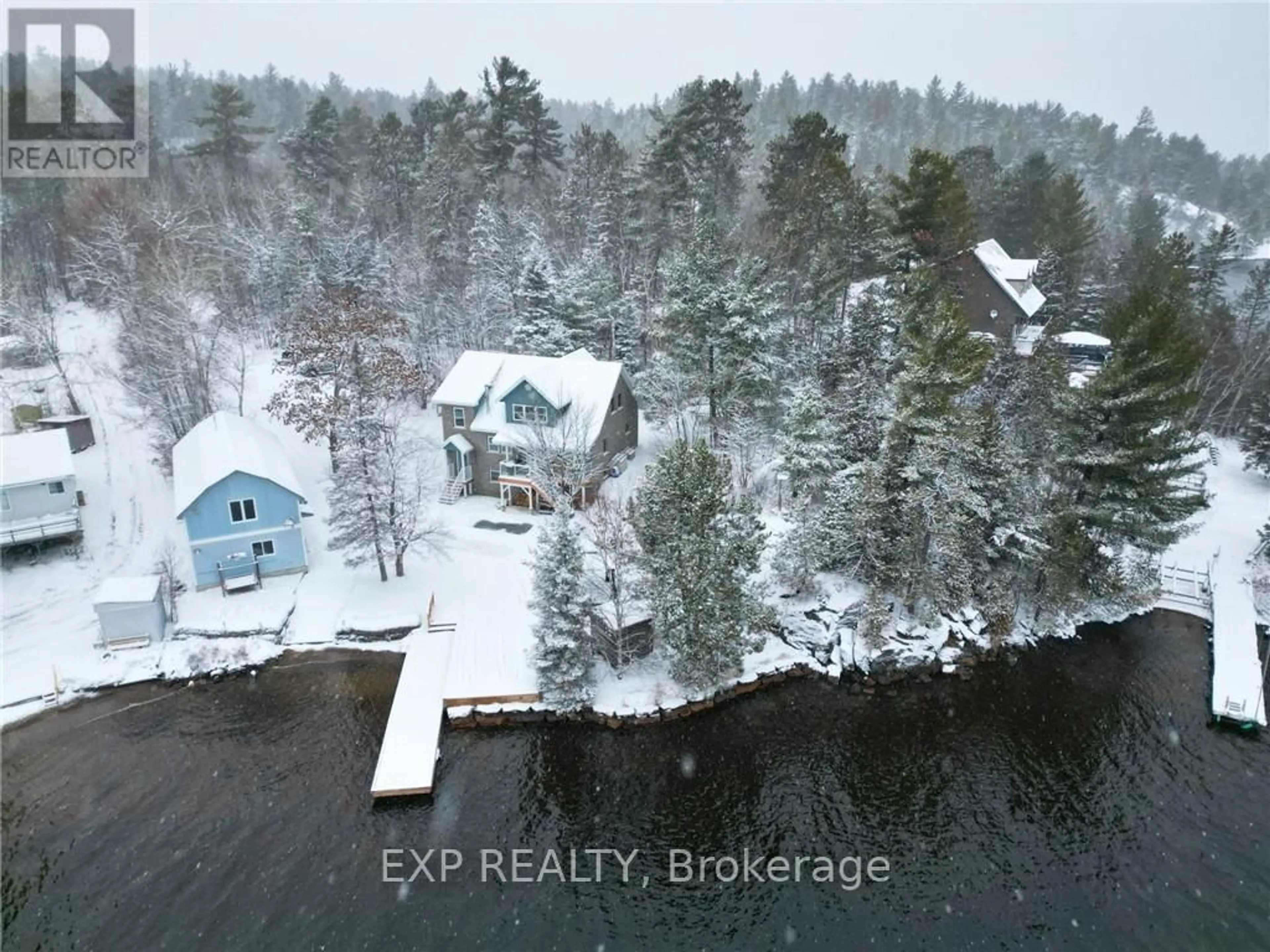 A pic from outside/outdoor area/front of a property/back of a property/a pic from drone, water/lake/river/ocean view for 1168 C West Bay Rd, Greater Sudbury Ontario P0M 1H0