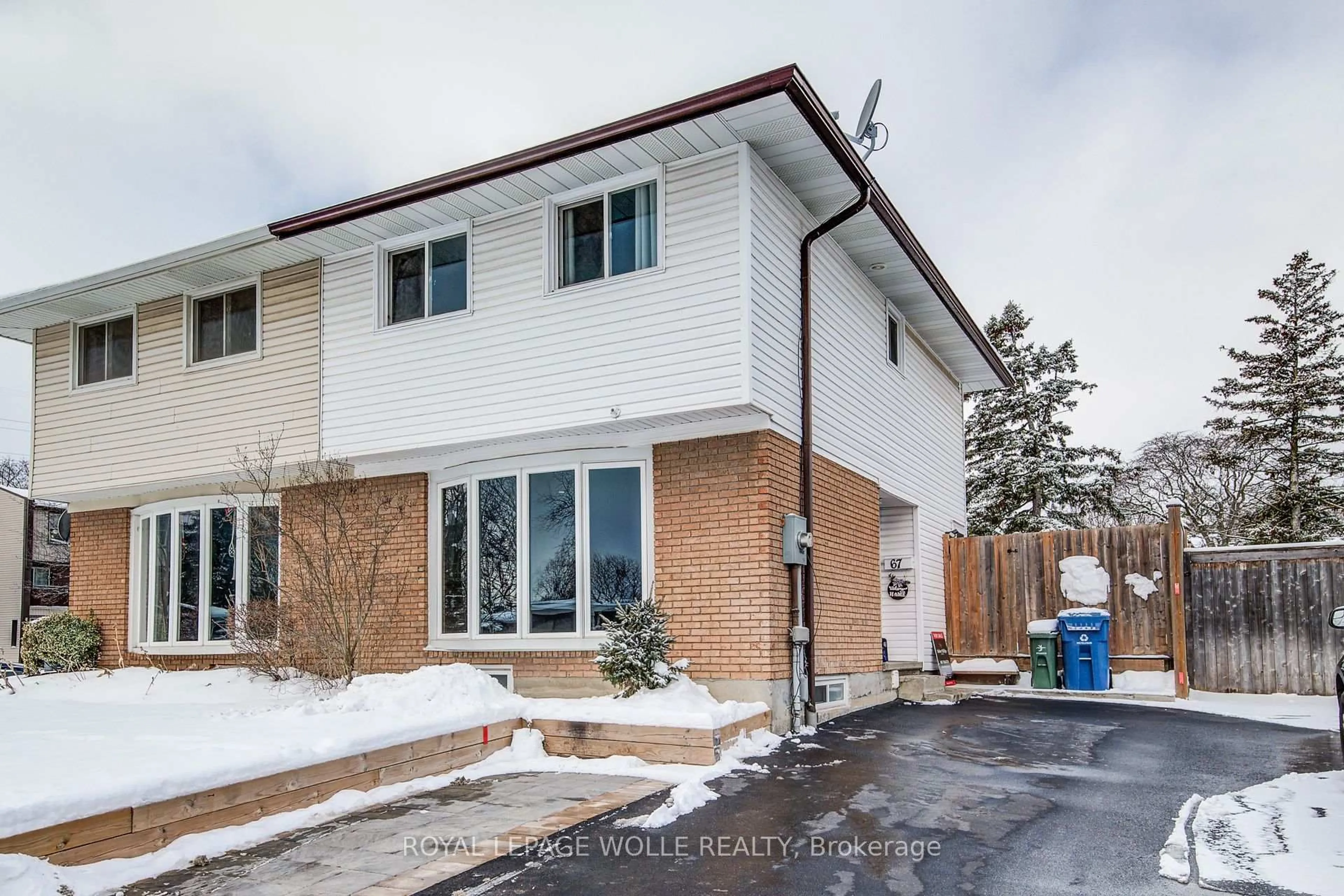 Home with brick exterior material, street for 67 Burns Dr, Guelph Ontario N1H 6V8