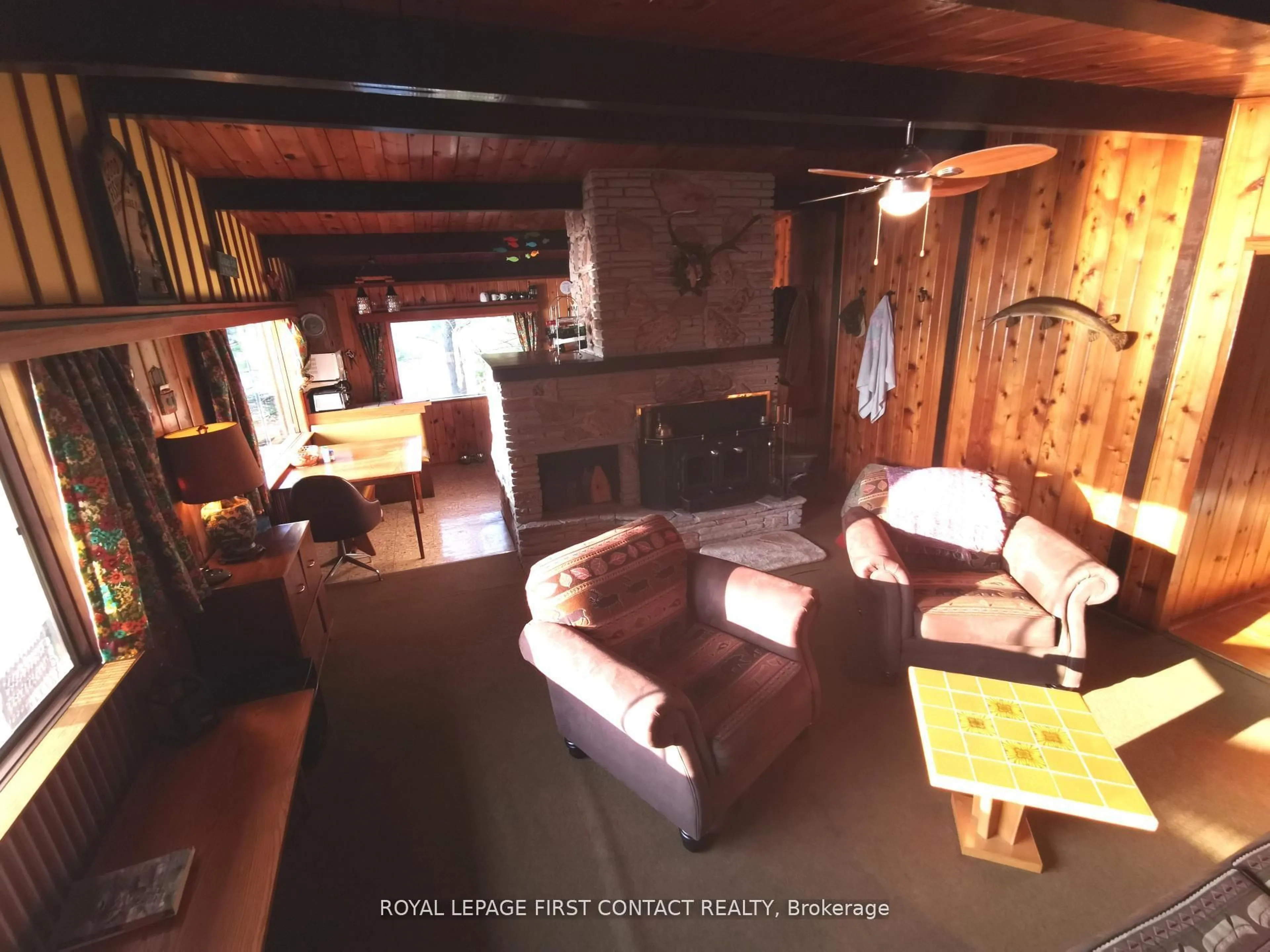 Living room with furniture, wood/laminate floor for 111 Healey Lake Water, The Archipelago Ontario P0C 1H0