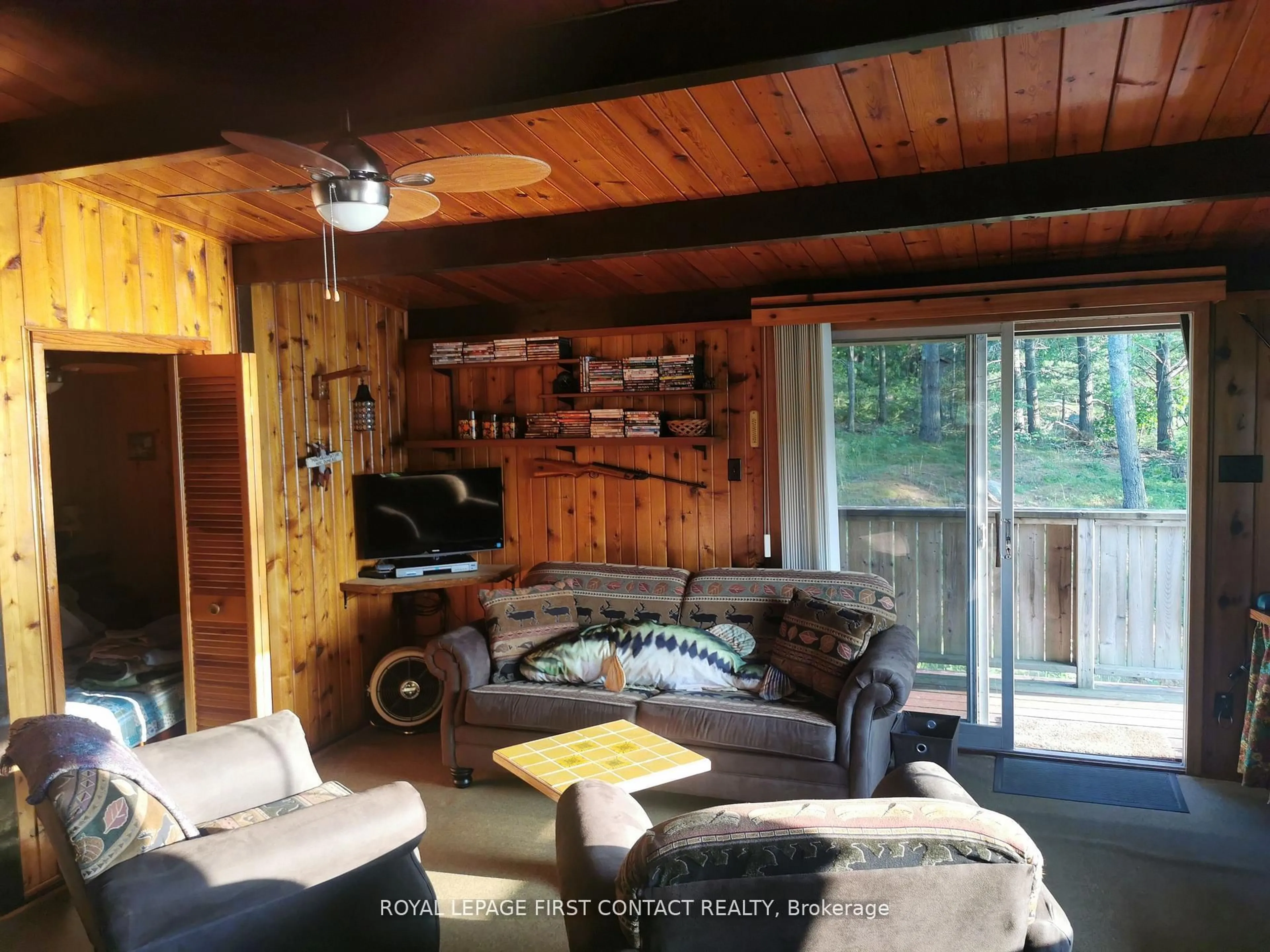 Living room with furniture, wood/laminate floor for 111 Healey Lake Water, The Archipelago Ontario P0C 1H0