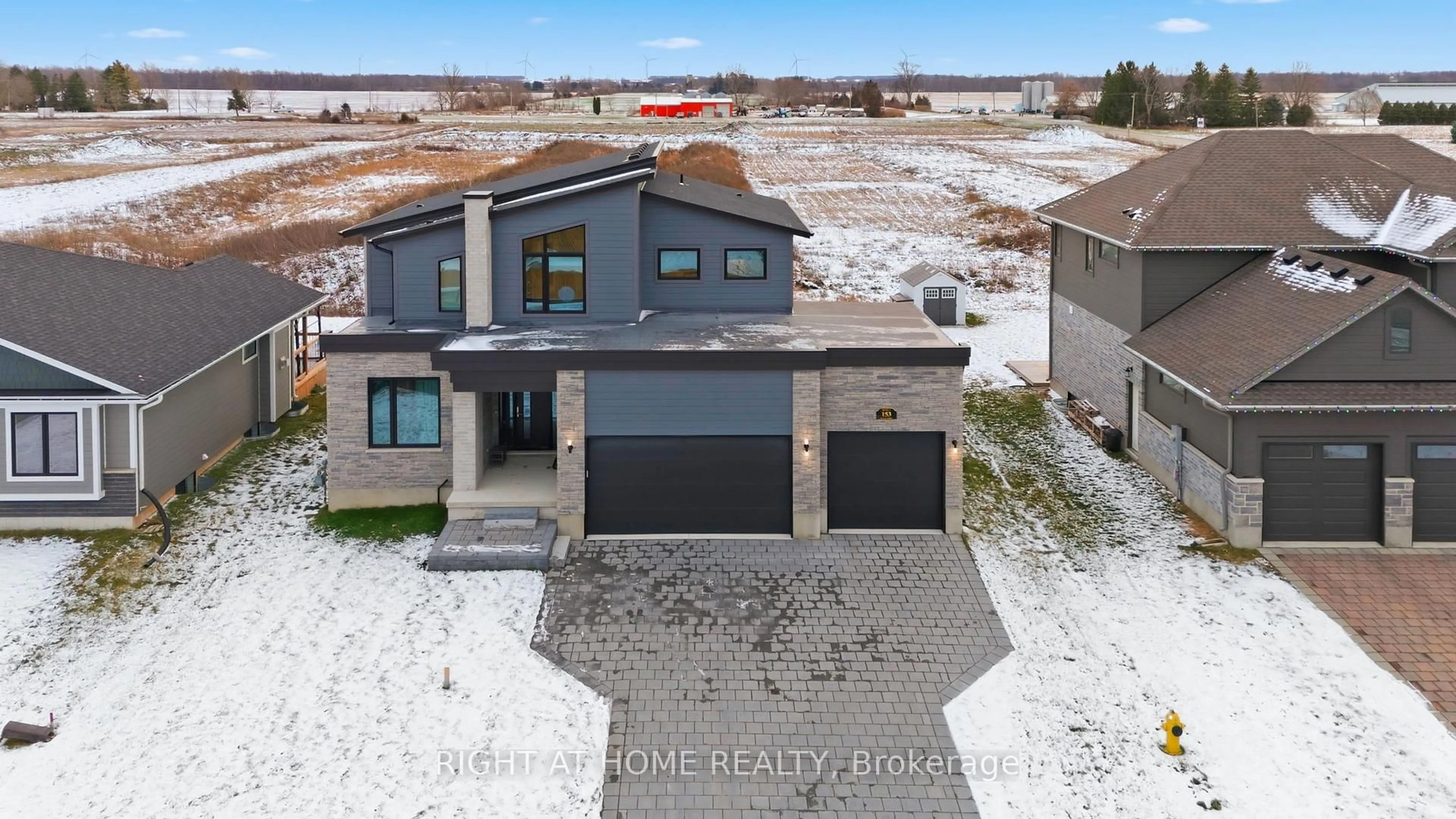 A pic from outside/outdoor area/front of a property/back of a property/a pic from drone, street for 153 McLeod St, North Middlesex Ontario N0M 2K0